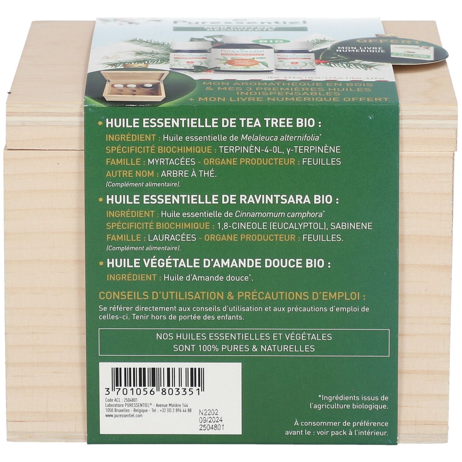 Coffret en bois avec informations produit. Inscription : "Huile essentielle de Tea Tree Bio".