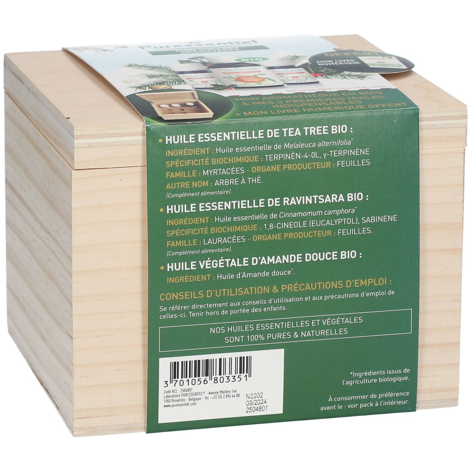 Coffret en bois avec informations produit. Inscription : "Huile essentielle de Tea Tree Bio".