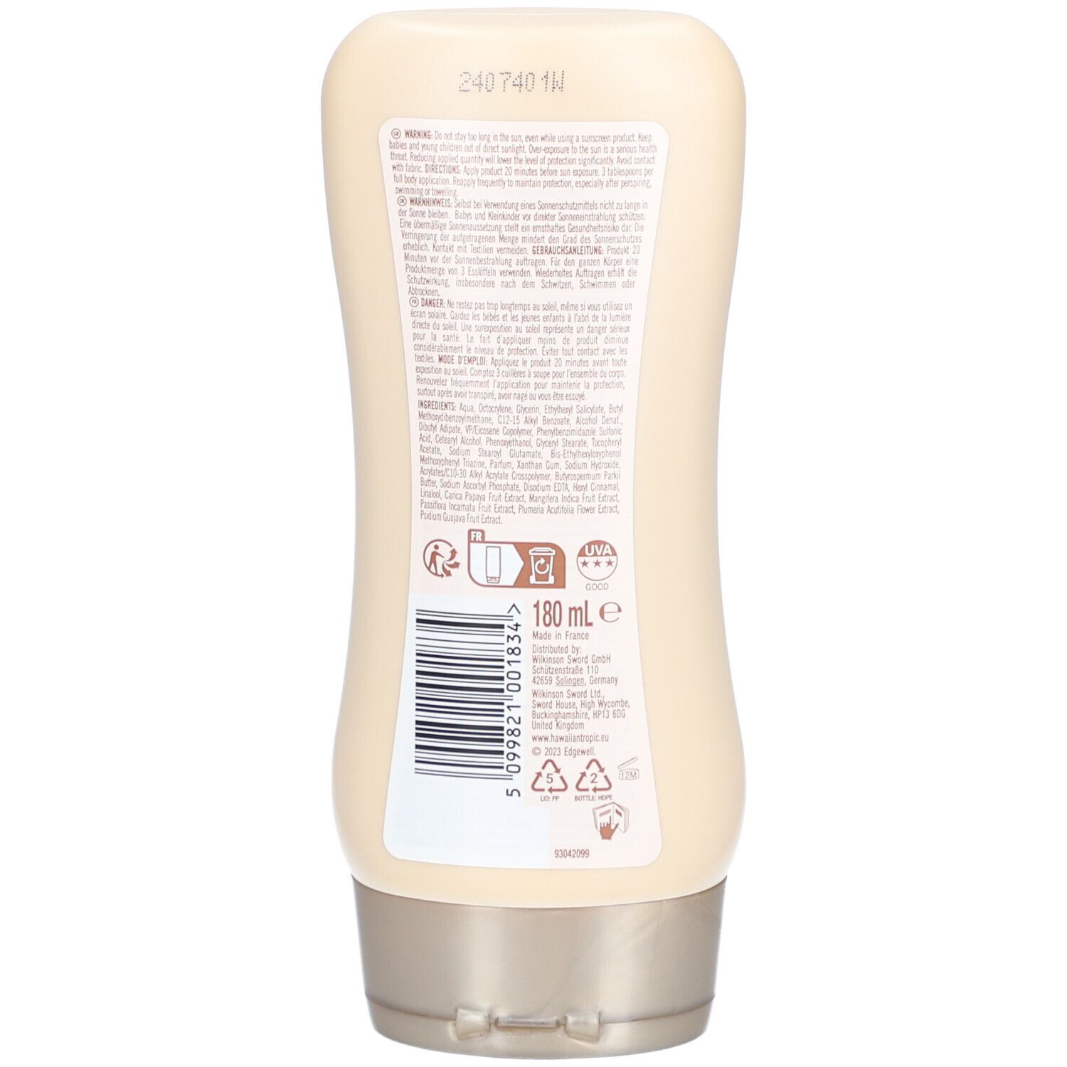 Rückseite einer beigen Sonnenlotion-Flasche. Text in mehreren Sprachen. Volumen: 180 ml. Mit Recycling-Symbolen.