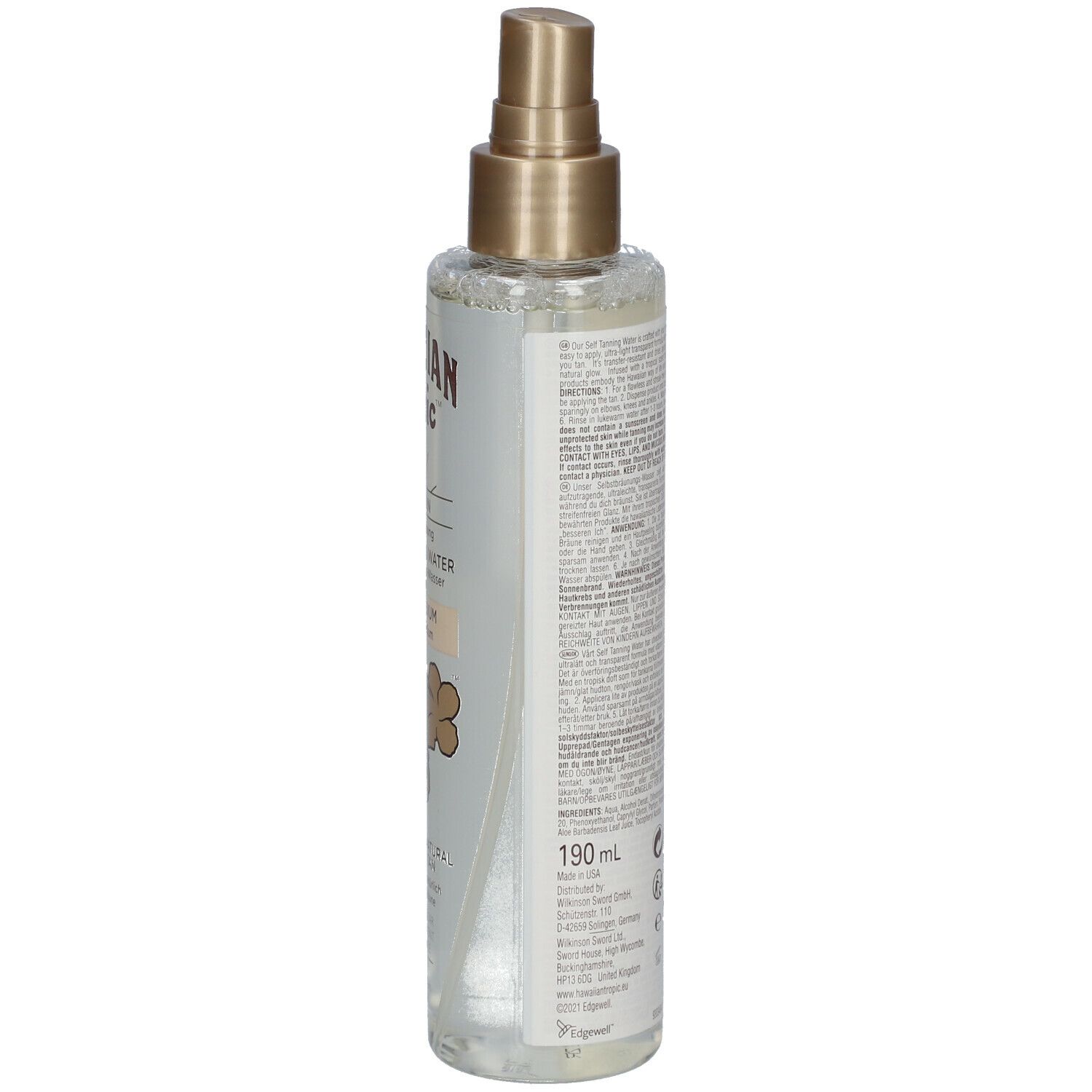 Flacon de brume autobronzante. Inscription: Hawaiian Tropic, Self Tan, Light/Medium. Décor floral. 190 ml.