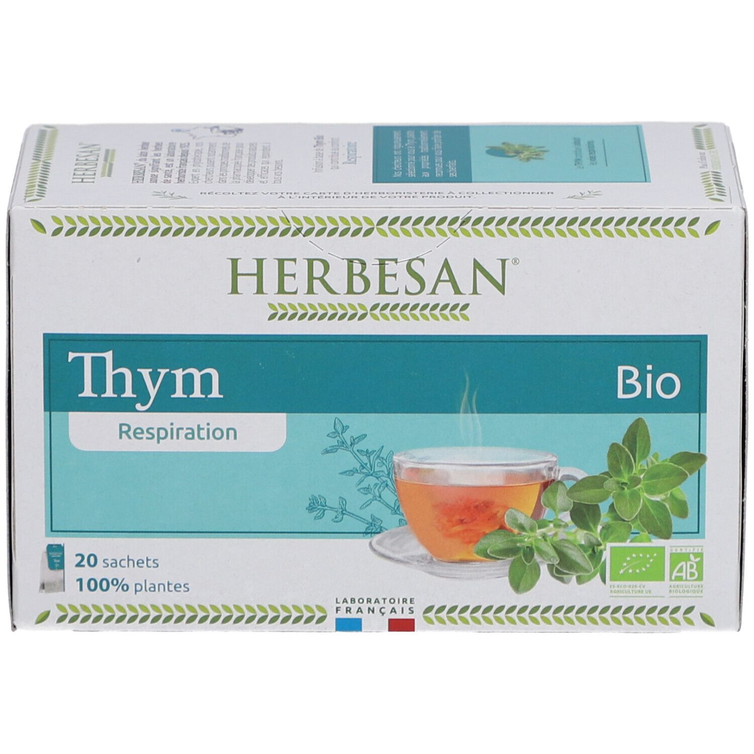 Karton Herbesan Bio Thymian Kräutertee. Aufdruck: Thym, Bio, 20 Sachets, 100% plantes. Mit Abbildung von Tee und Thymian.