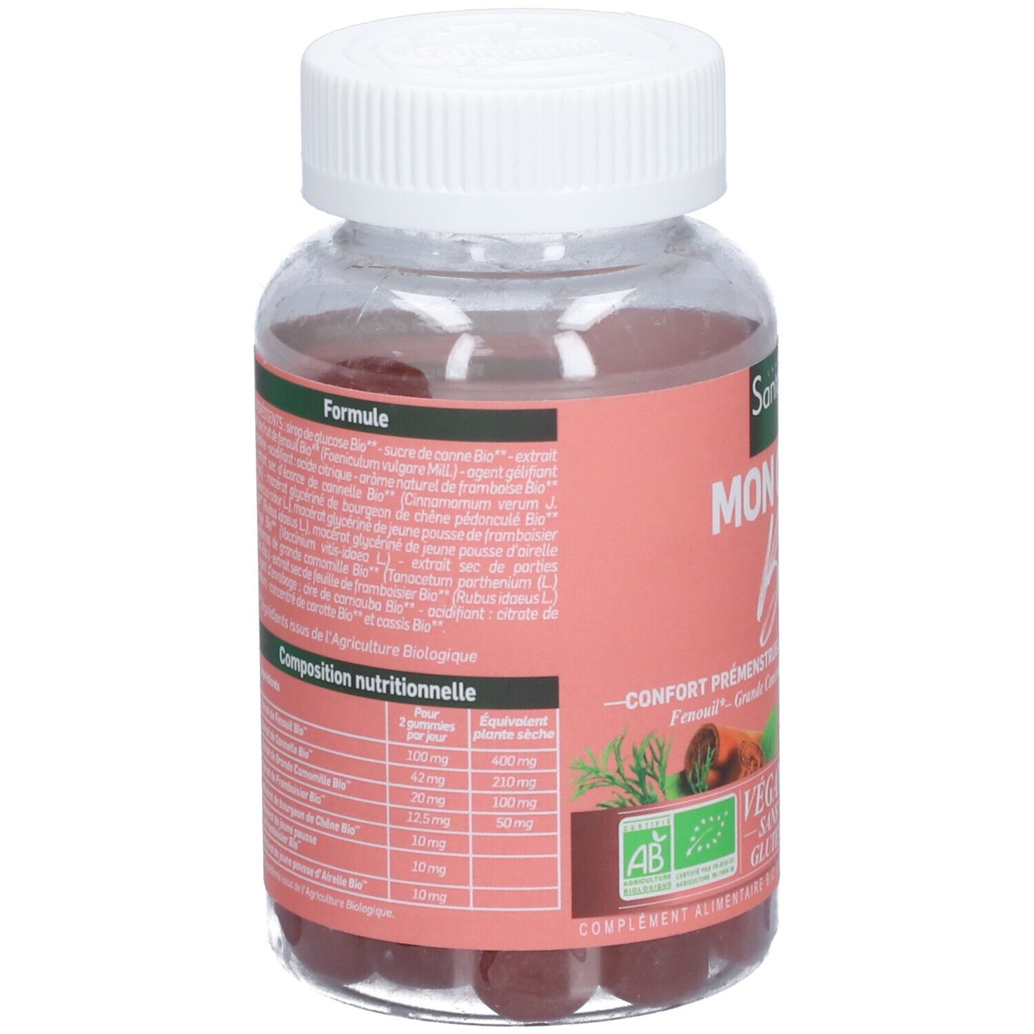 Flacon transparent avec bonbons rouges. Étiquette rose avec texte et liste d'ingrédients. Bouchon blanc.