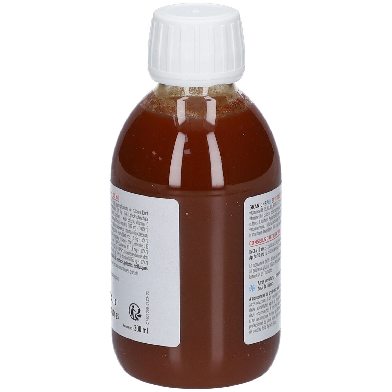 Dos du flacon de liquide brun avec bouchon blanc. Étiquette avec informations sur GRANIONS® KID, 23 Vitamines, Minéraux & Plantes.