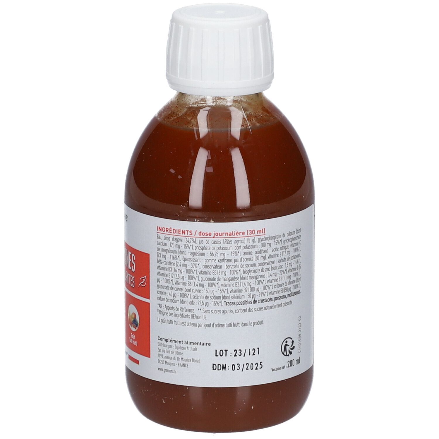 Dos du flacon de liquide brun avec bouchon blanc. Étiquette avec ingrédients et date de péremption. GRANIONS® KID, 23 Vitamines.