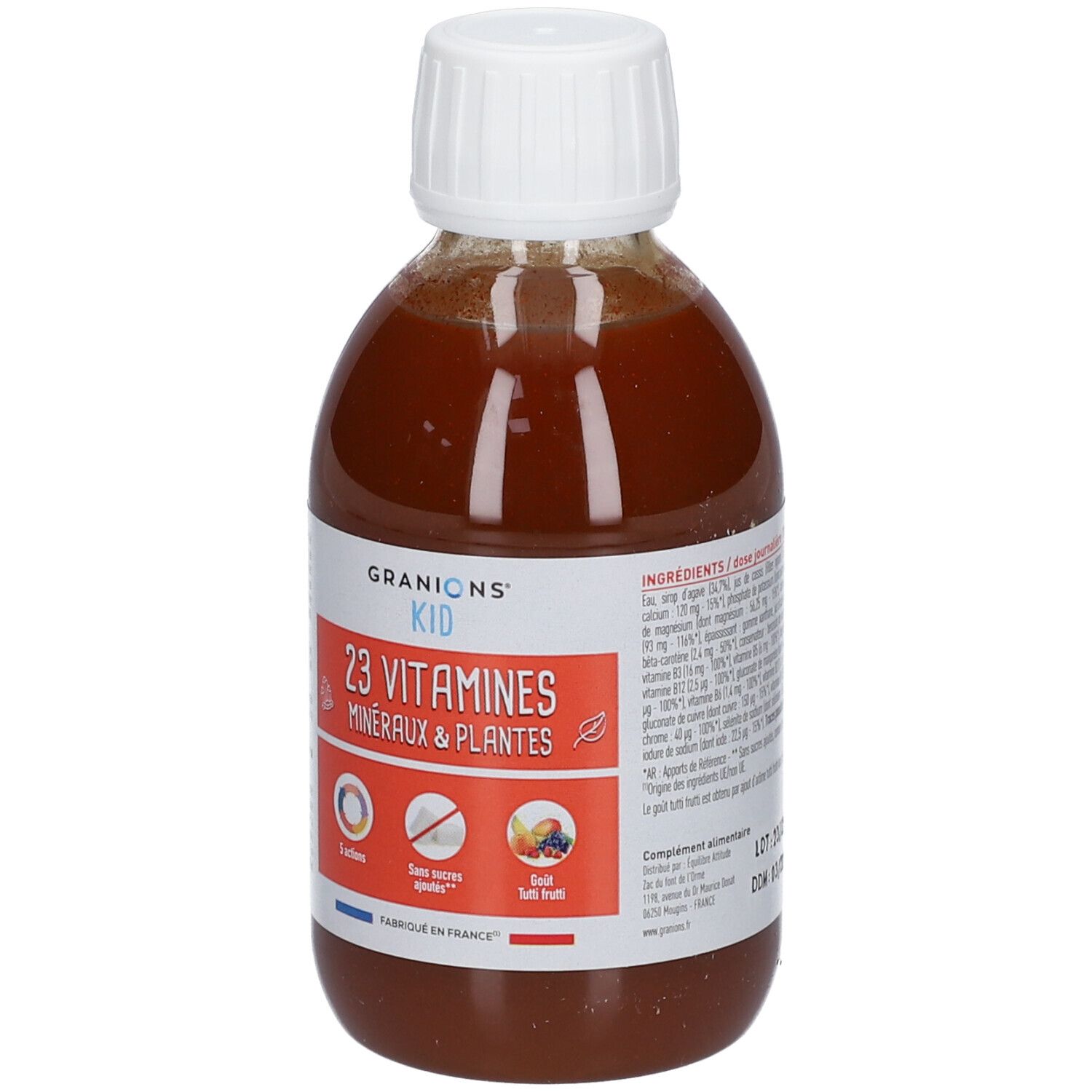 Flacon de liquide brun avec bouchon blanc. Étiquette GRANIONS® KID, 23 Vitamines, Minéraux & Plantes. Drapeau français.