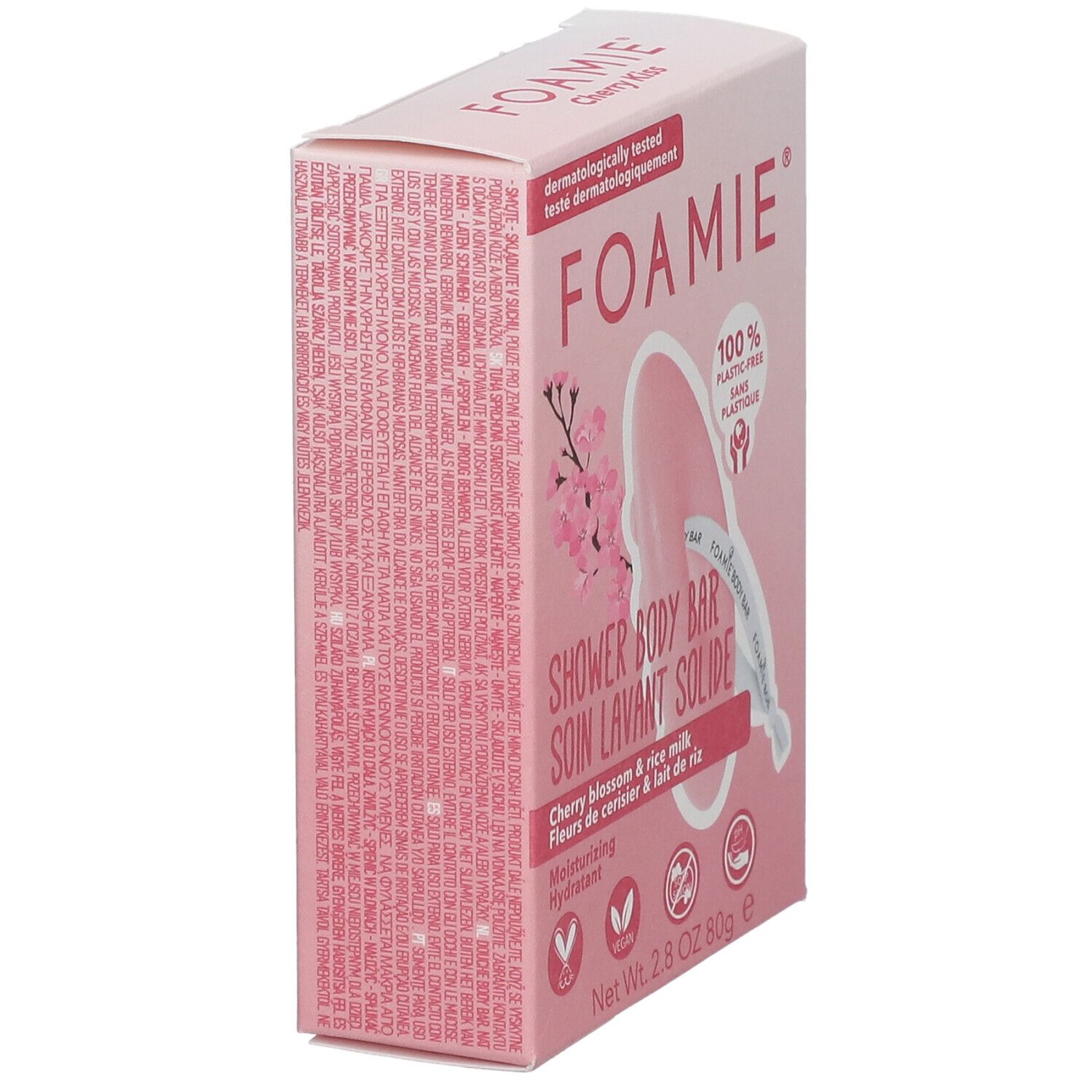 Schuin geplaatste, roze kartonnen verpakking met FOAMIE-logo en tekst. Bevat een vaste douchegel. Tekst in meerdere talen.
