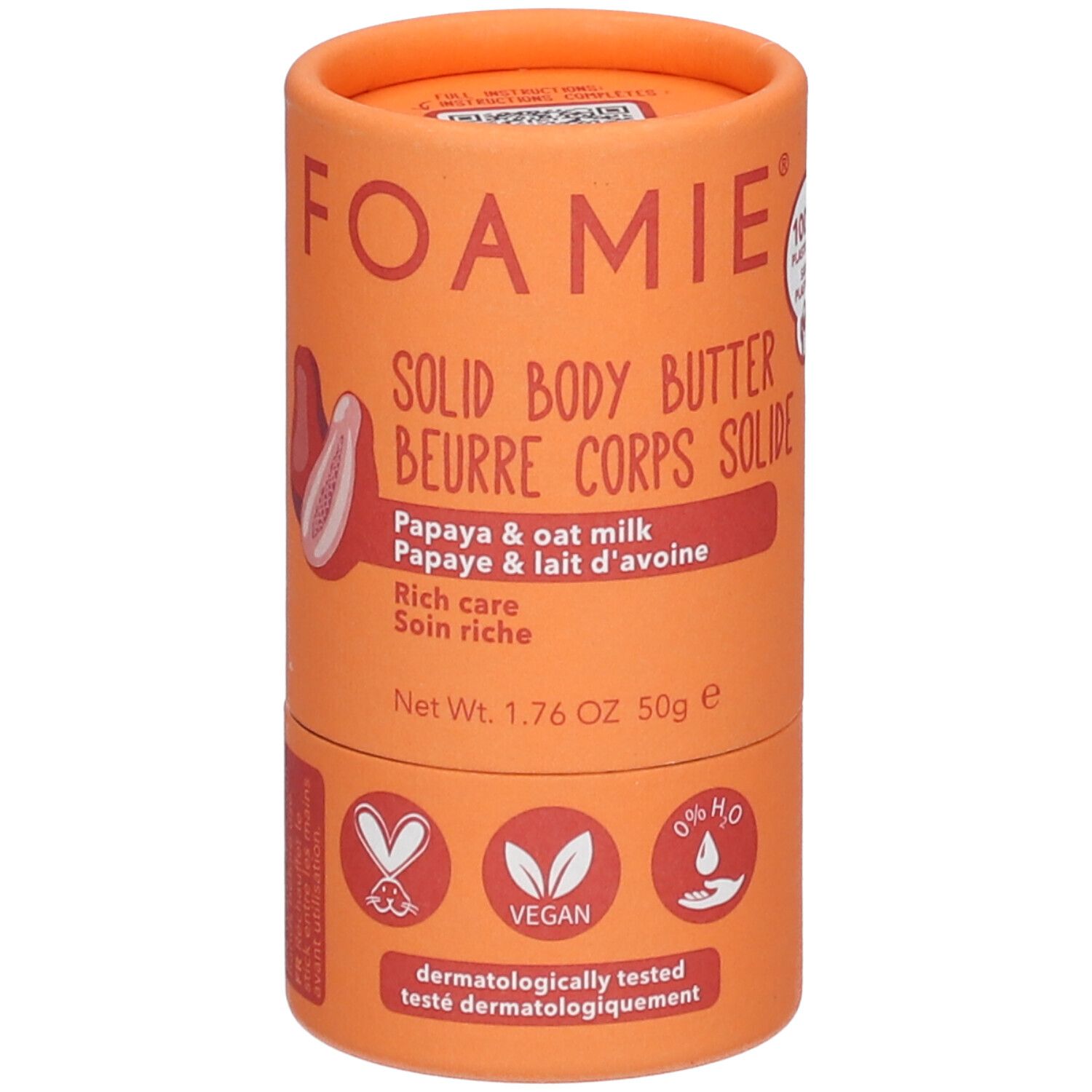 Emballage cylindrique orange. Nom du produit et illustration de papaye. Label végétalien. Poids net : 50g.