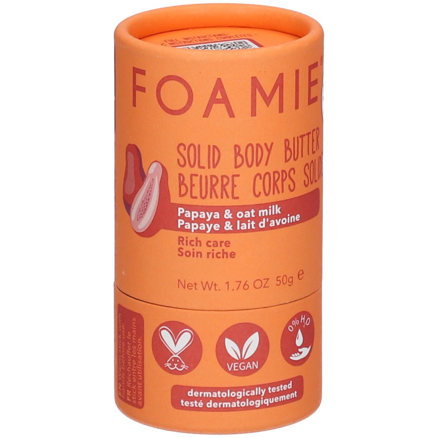 Emballage cylindrique orange. Nom du produit et illustration de papaye. Label végétalien. Poids net : 50g.