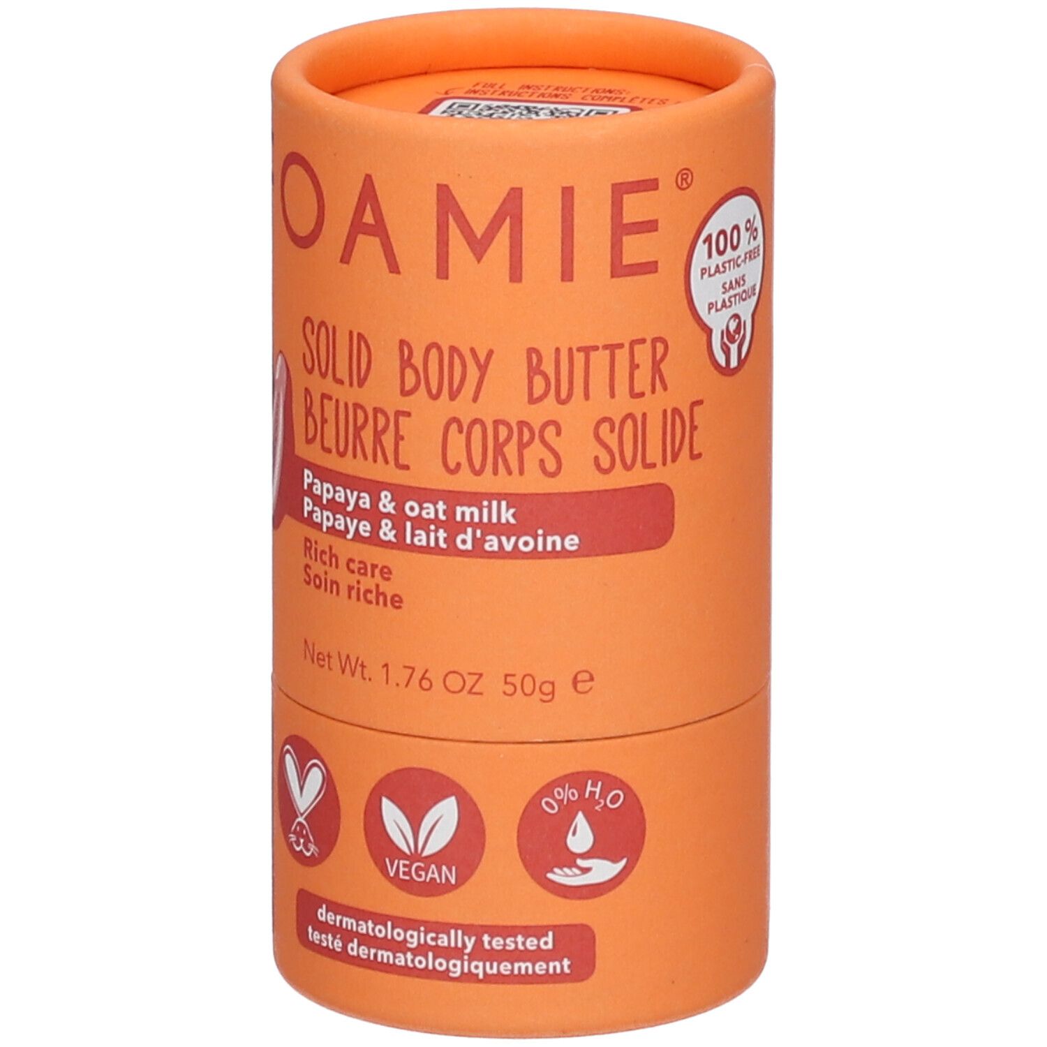 Emballage cylindrique orange. Nom du produit, illustration de papaye. Label végétalien. 0% H2O. 100% sans plastique.