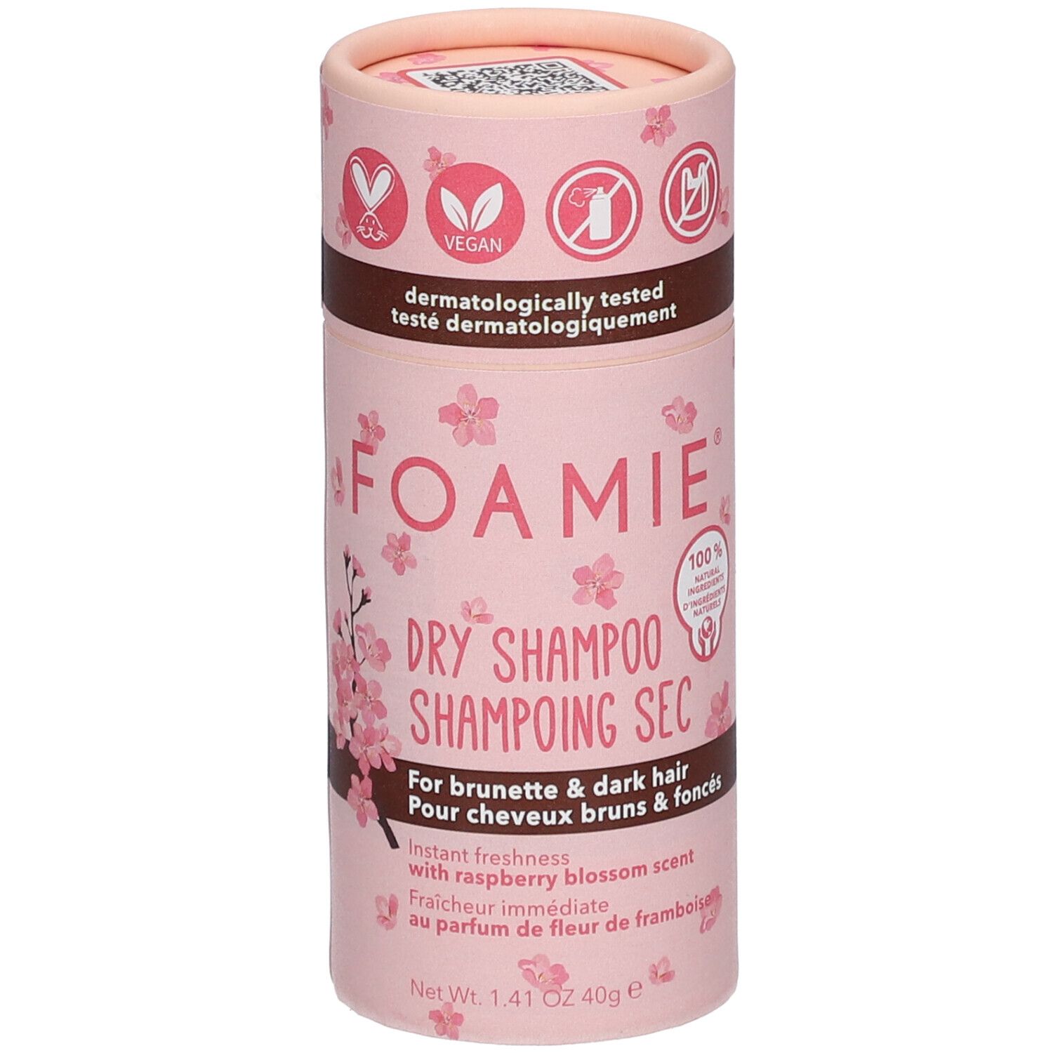 Emballage cylindrique rose. Inscription: FOAMIE, Shampoing Sec, pour cheveux bruns. Label vegan. Ingrédients 100% d'origine naturelle.