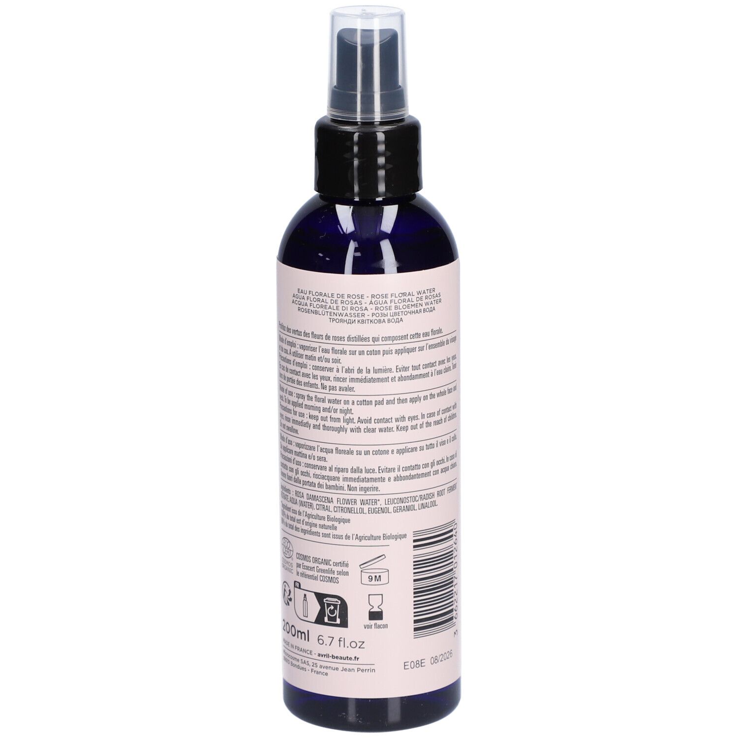 Dunkelblaue Sprühflasche mit rosa Etikett. Text auf der Rückseite. Produktinformationen, Inhaltsstoffe und Anweisungen.