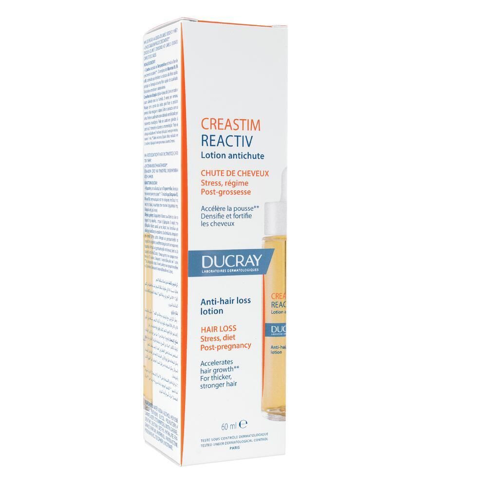 Emballage carton avec flacon. Nom du produit et marque visibles.