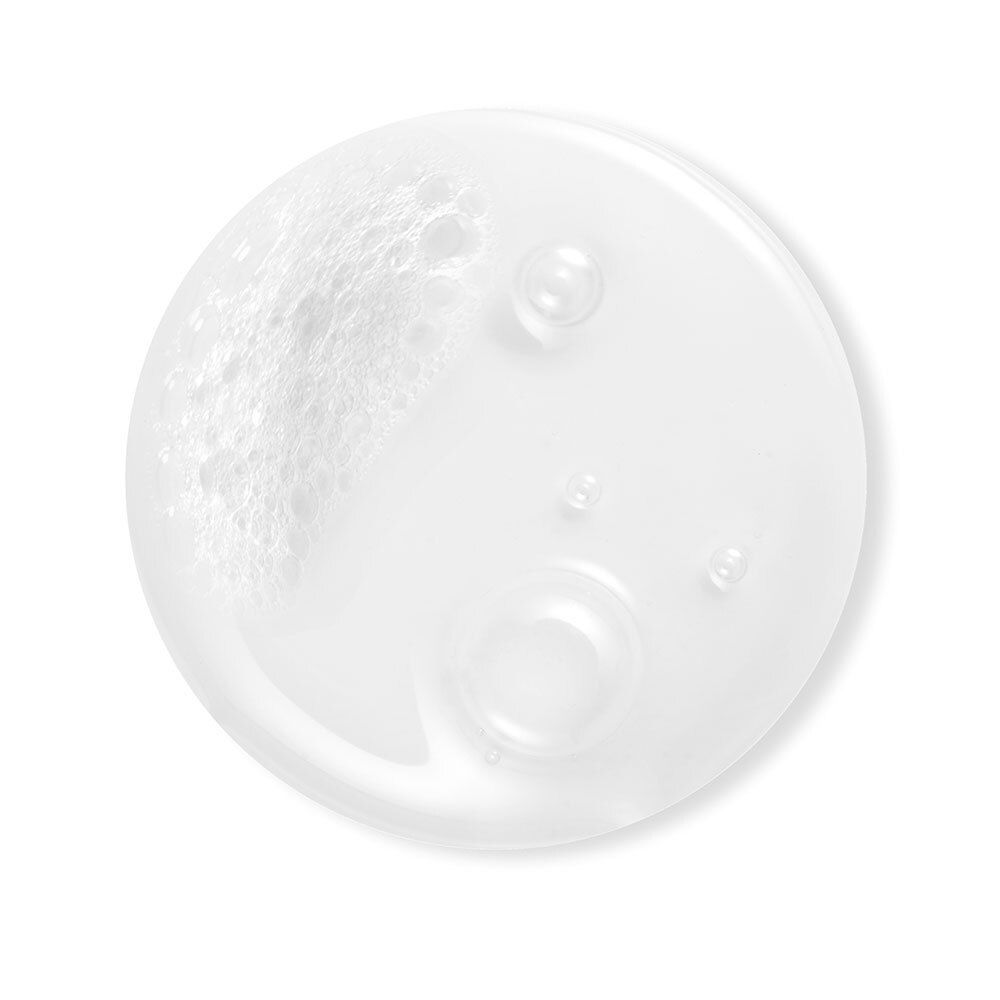 Gros plan sur une texture blanche et moussante avec des bulles. Sur fond blanc.