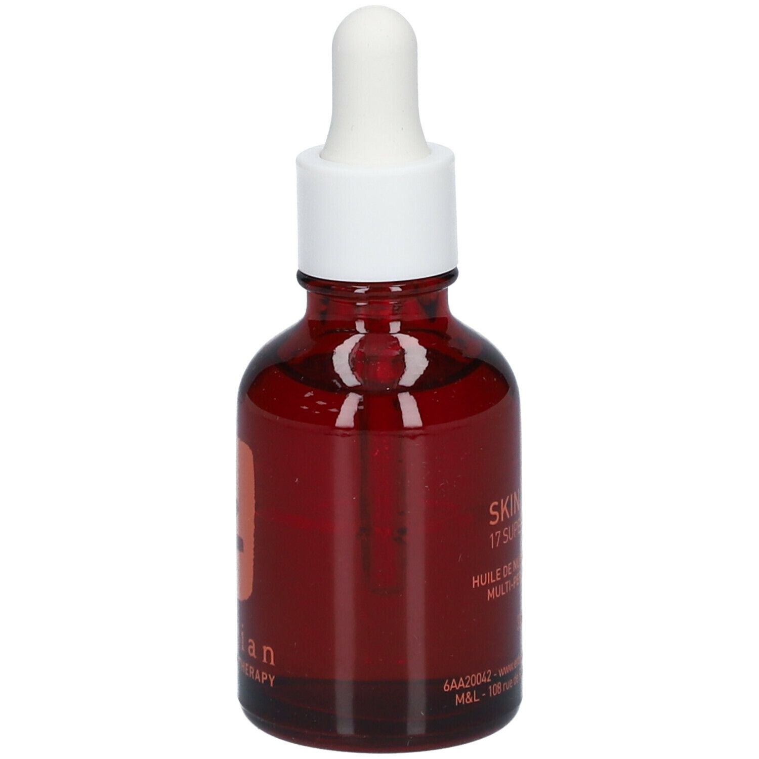 Flacon en verre brun avec bouchon et pipette blancs. Inscription : Skin Therapy, Huile de Nuit Multi-Perfectrice.