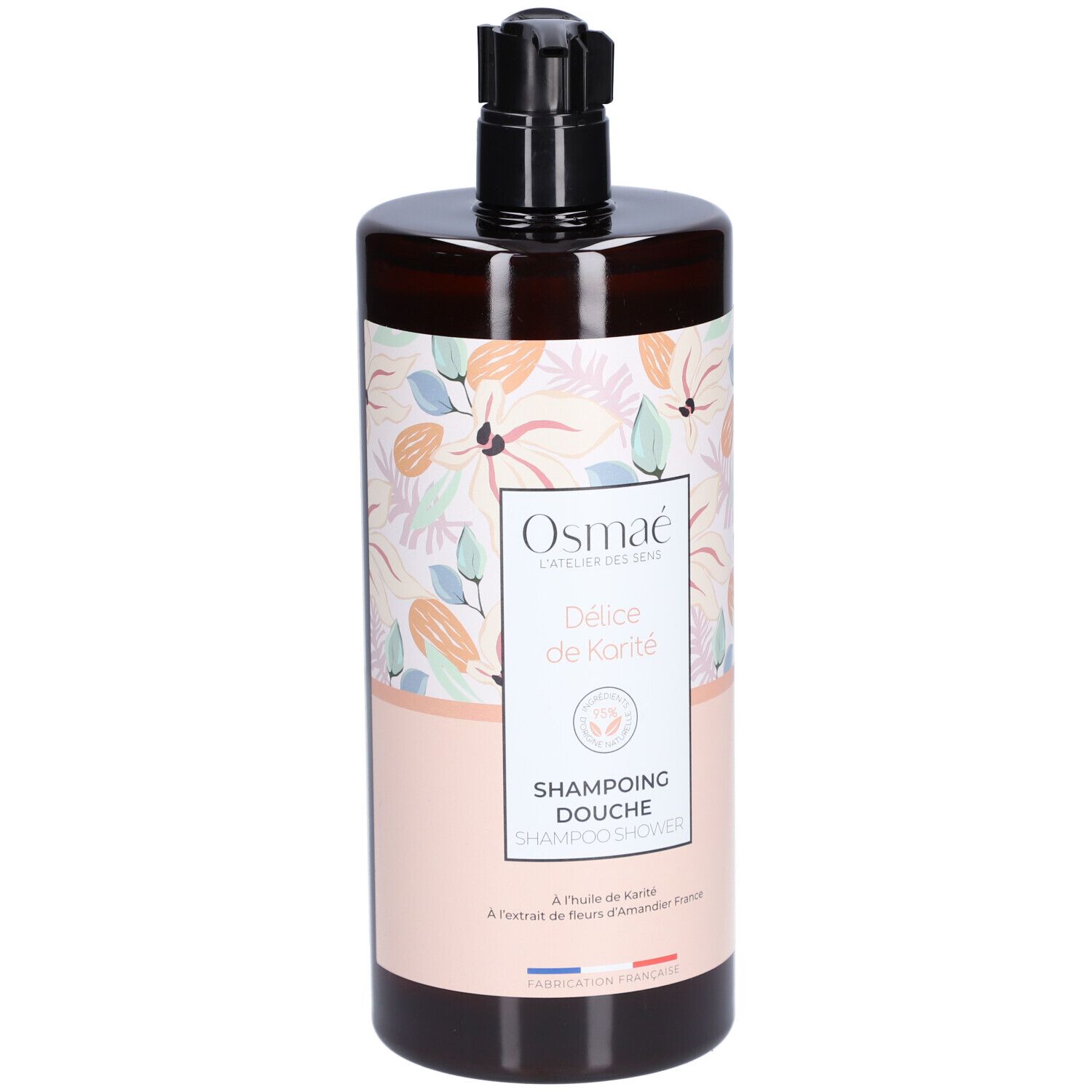 Flacon marron avec pompe noire. Étiquette florale et texte: Shampoing Douche Délice de Karité. Logo Osmaé.