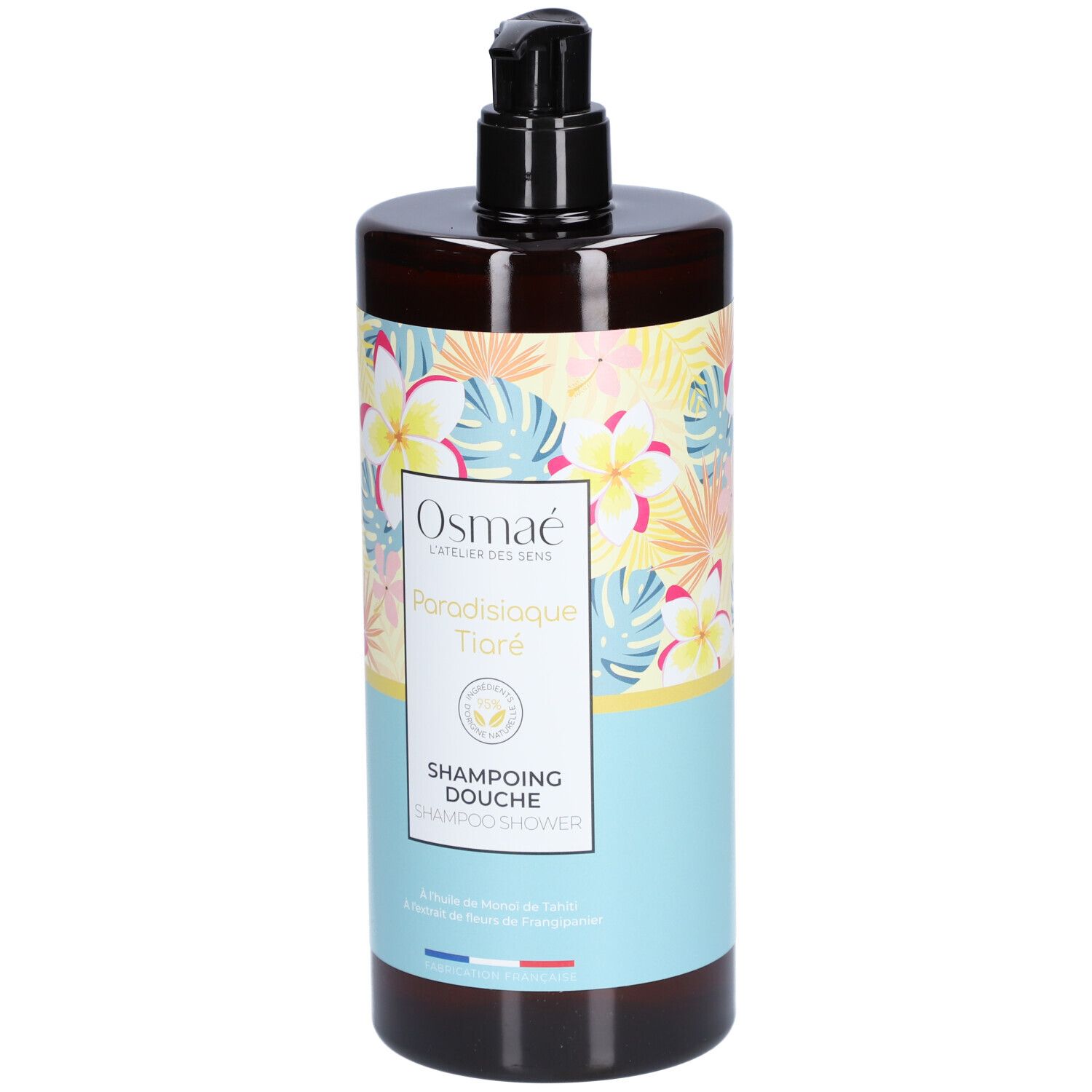 Flacon marron avec pompe noire. Étiquette avec motif floral et texte: Osmaé, Paradisiaque Tiaré, Shampoing Douche.