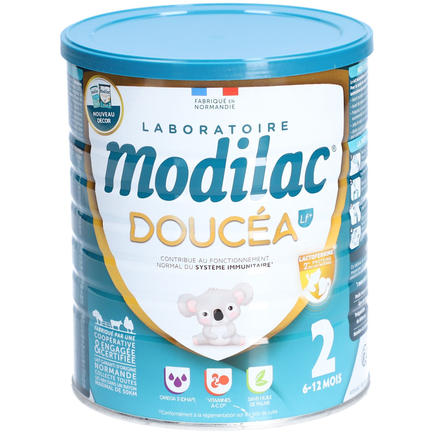 Boîte de lait en poudre Modilac Doucéa 2. Couvercle bleu clair, fond blanc. Inscription et illustration de koala.