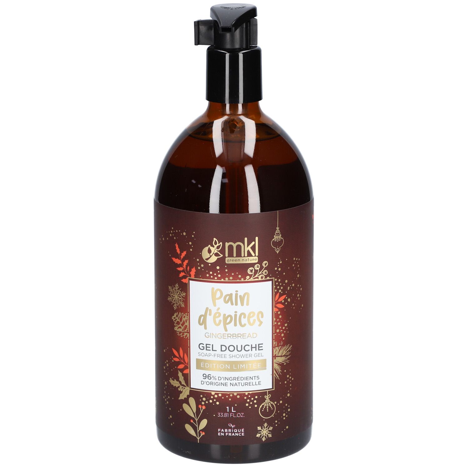 Flacon marron avec pompe noire. Inscription: Pain d'épices, Gel Douche, 1L. Éléments décoratifs.