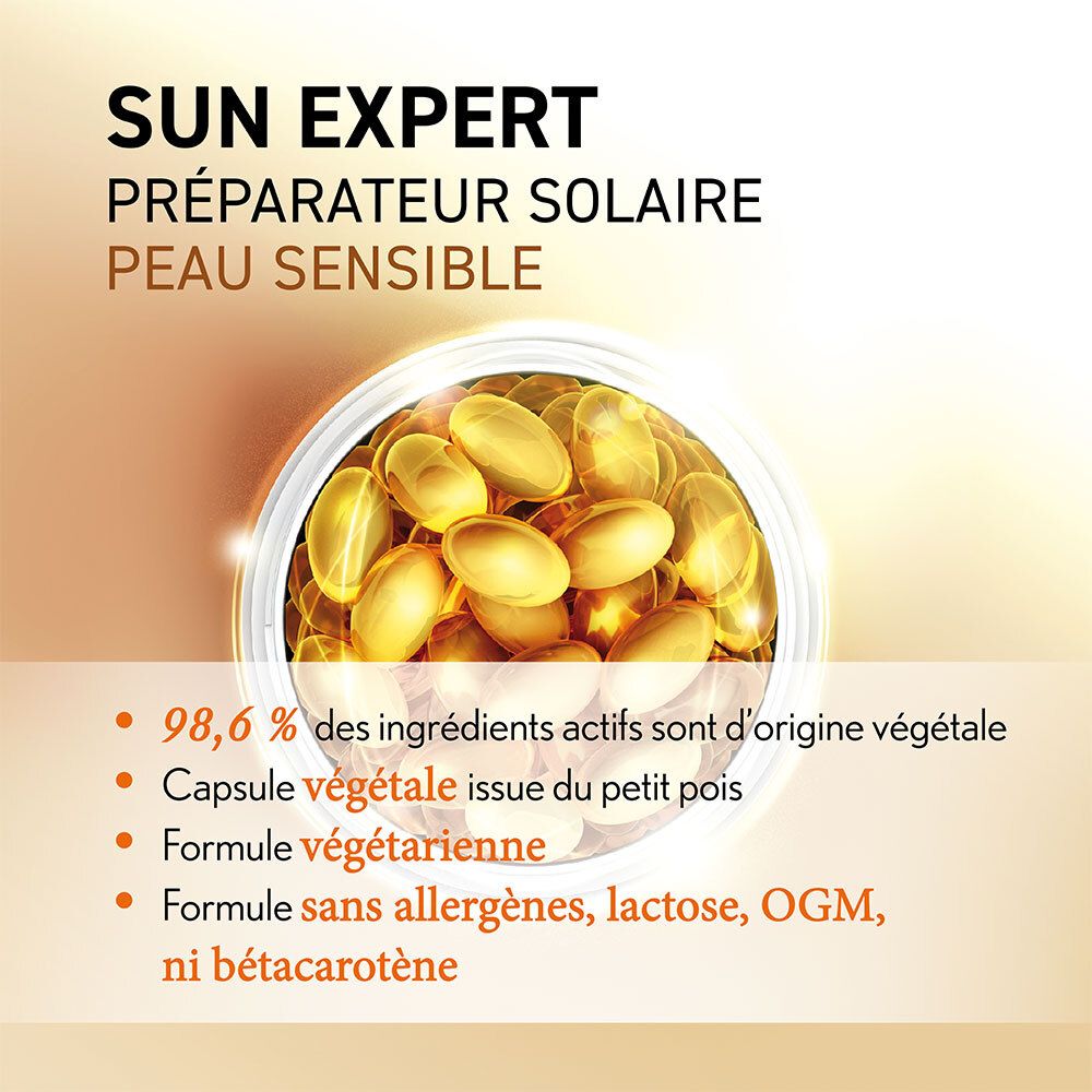 Texte : SUN EXPERT. Texte : 98,6% des ingrédients actifs sont d'origine végétale. Capsule de pois.
