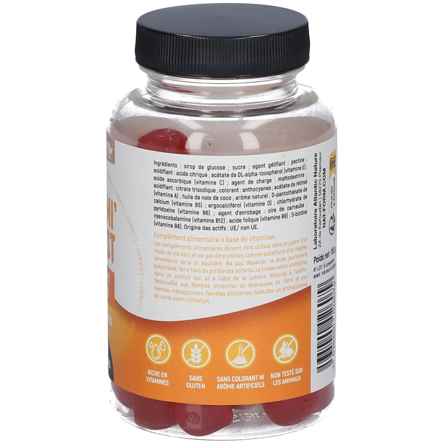 Rückseite der Flasche. Etikett mit Inhaltsstoffen, Vitaminen und Verzehrempfehlung. 'Sans colorant M', 'Non testé sur les animaux'.
