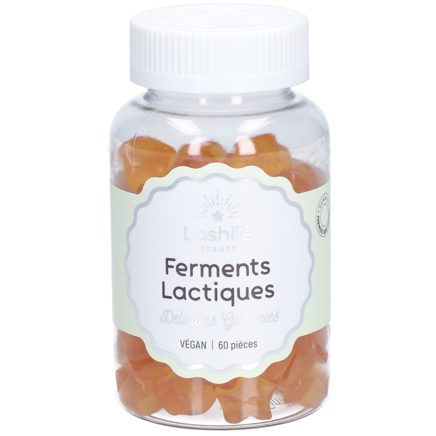 Flacon transparent avec gummies oranges. Étiquette : "Ferments Lactiques", "60 pièces".