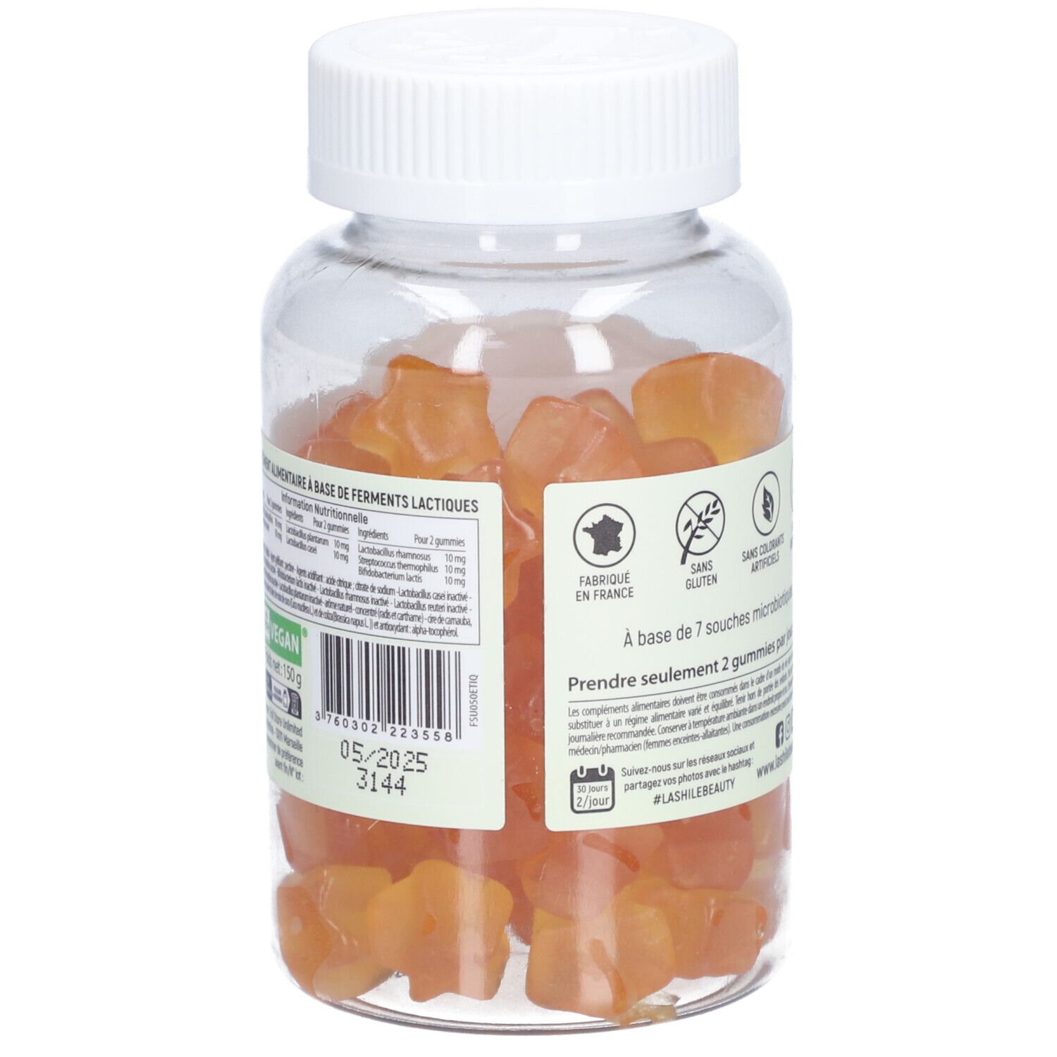 Flacon transparent avec gummies oranges. Étiquette : "Ferments Lactiques". Logos : sans gluten, fabriqué en France.