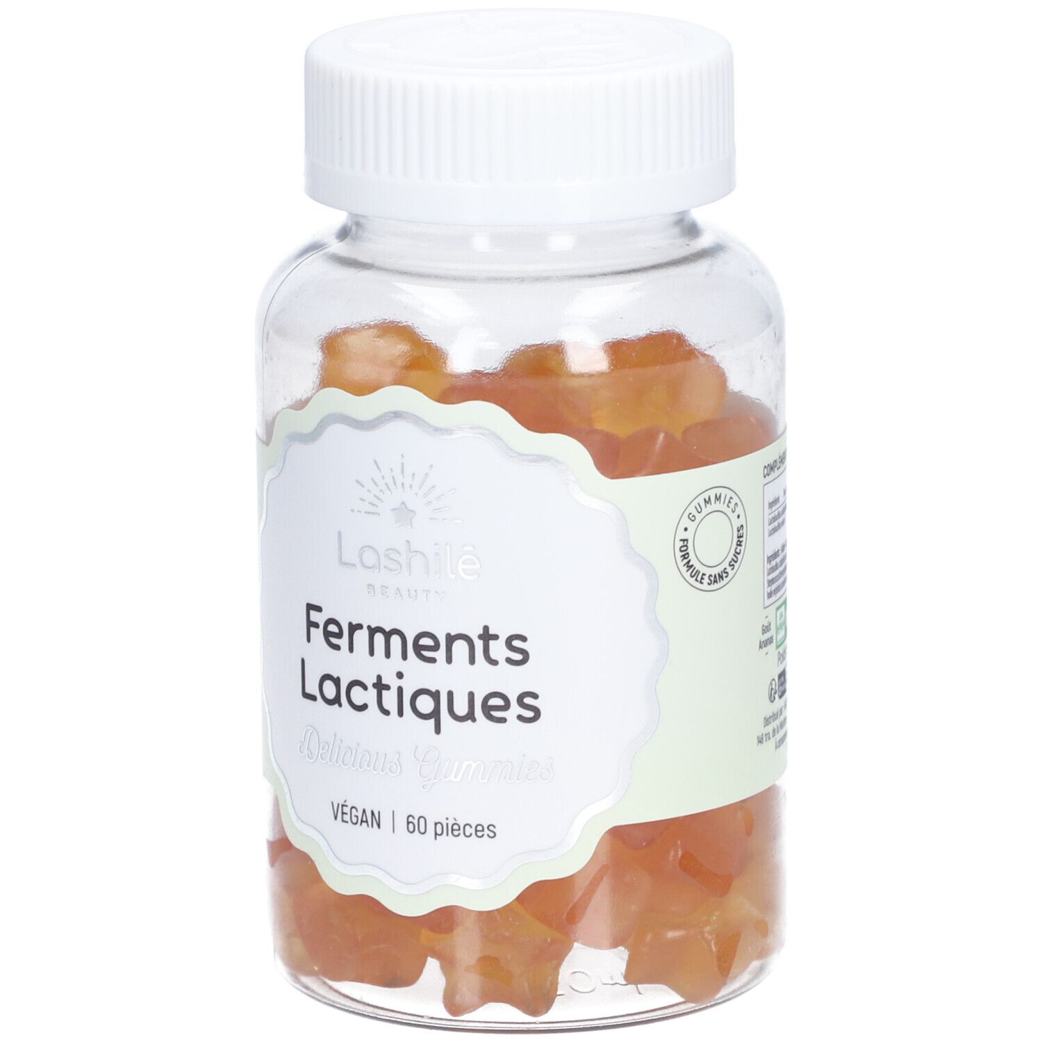Flacon transparent avec gummies oranges. Étiquette : "Ferments Lactiques", "60 pièces".