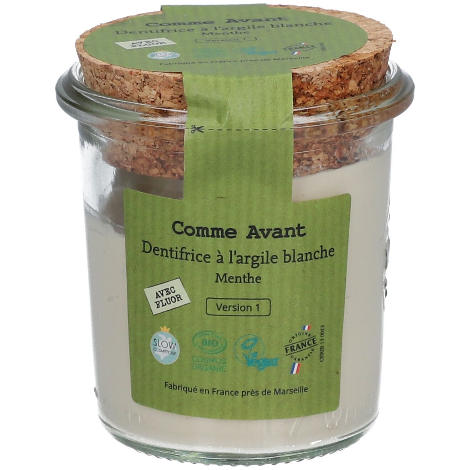 Pot en verre avec pâte blanche, couvercle en liège et étiquette verte. Texte: Comme Avant, dentifrice à l'argile blanche, menthe. Avec fluor.