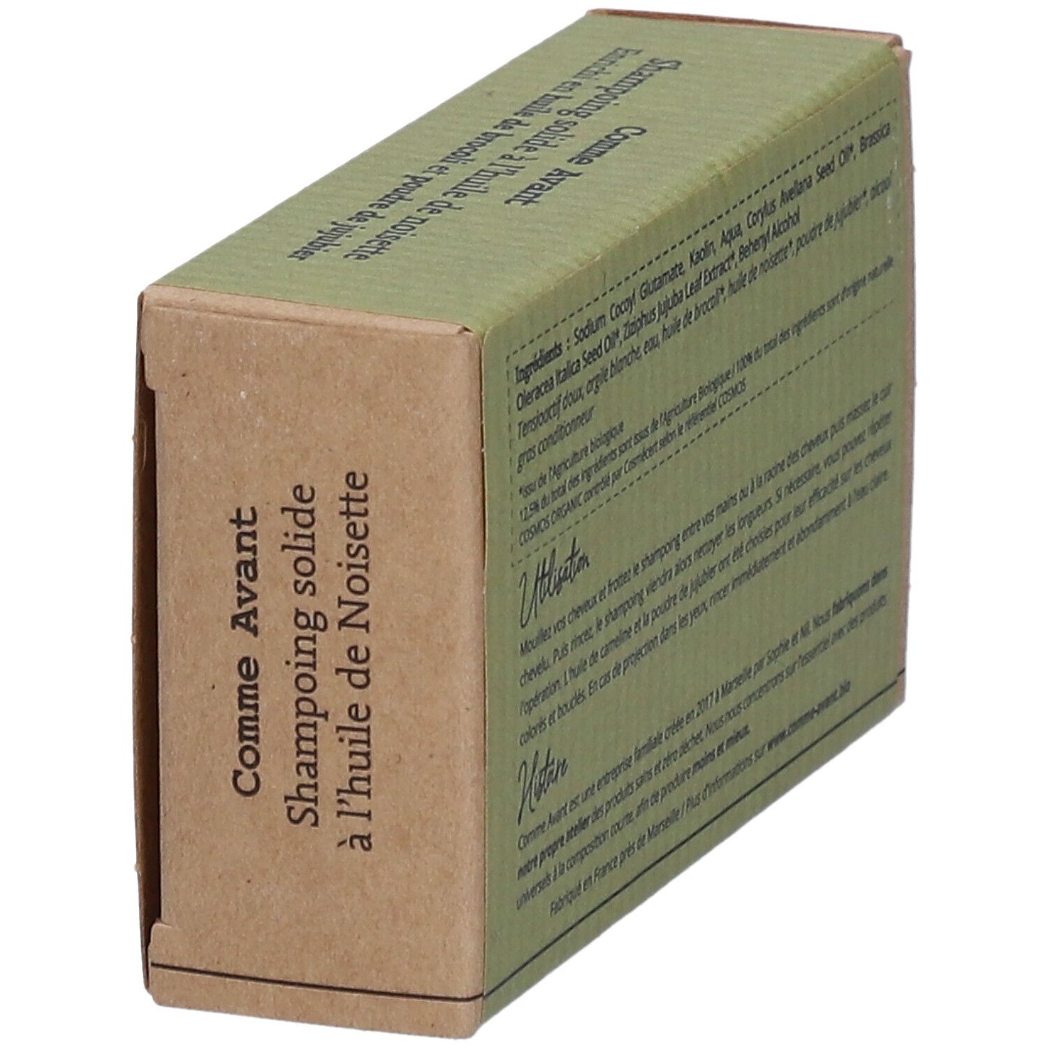 Boîte en carton, vue en biais. Texte: Comme Avant, Shampoing solide à l'huile de noisette. Ingrédients et utilisation.