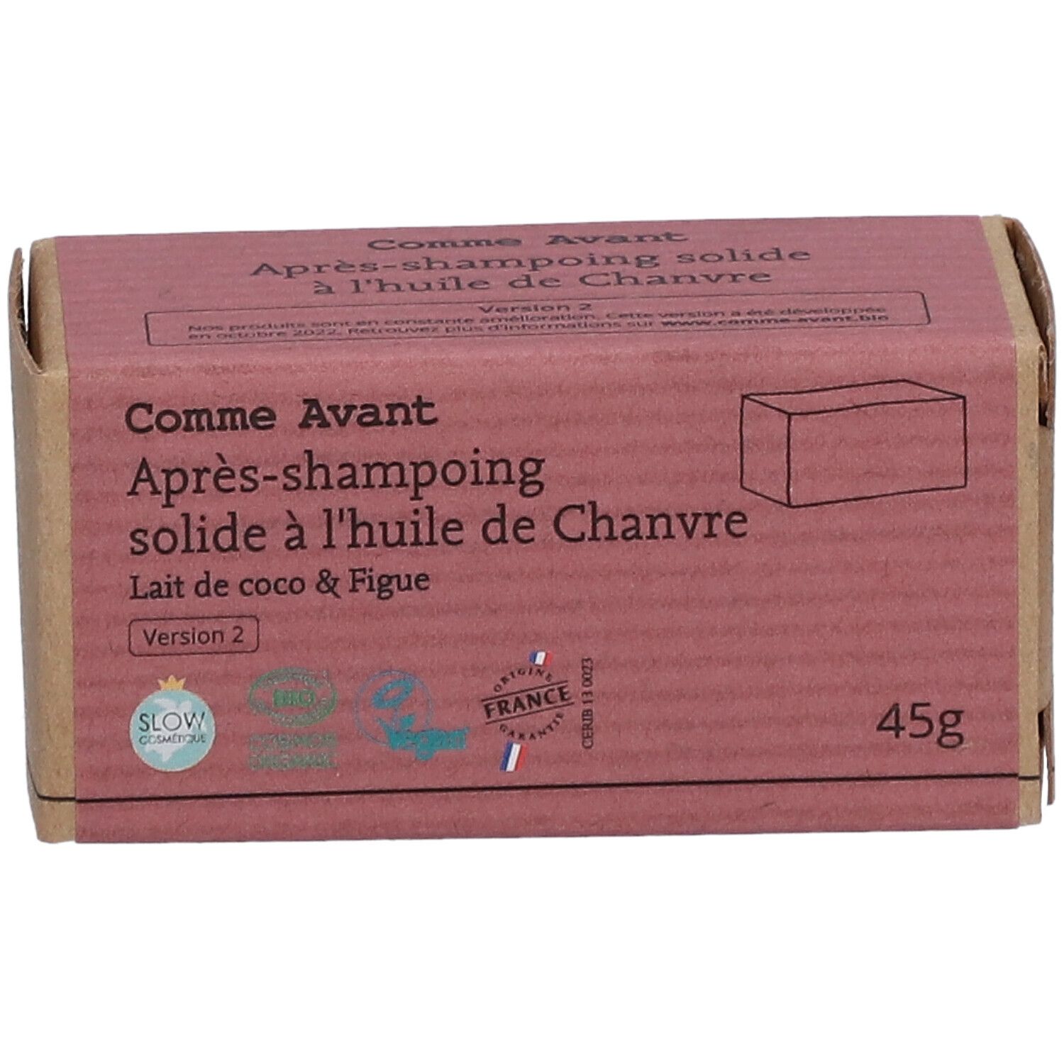 Boîte en carton avec nom et description du produit. Inscription : Après-shampooing solide à l'huile de Chanvre, Lait de coco & Figue.