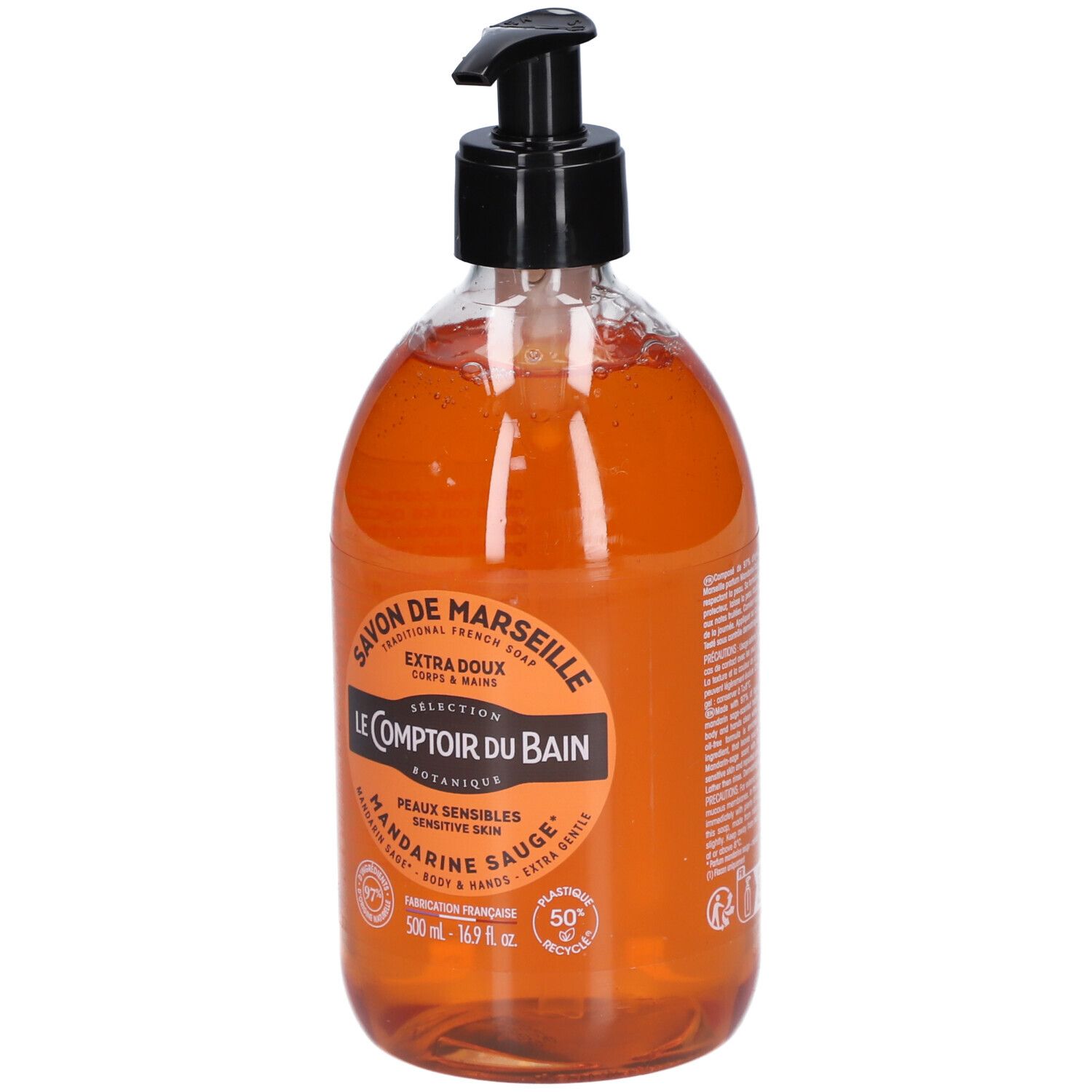 Flüssigseife von Le Comptoir du Bain. Orangefarbene Flüssigkeit in einer transparenten Flasche mit schwarzem Spender. Aufschrift: Savon de Marseille.