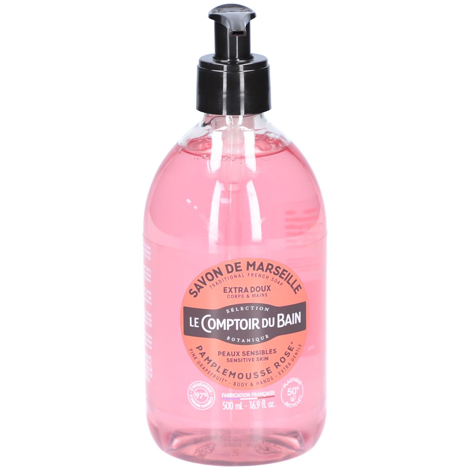 Flacon transparent de savon liquide rose avec pompe noire. Étiquette avec informations produit.