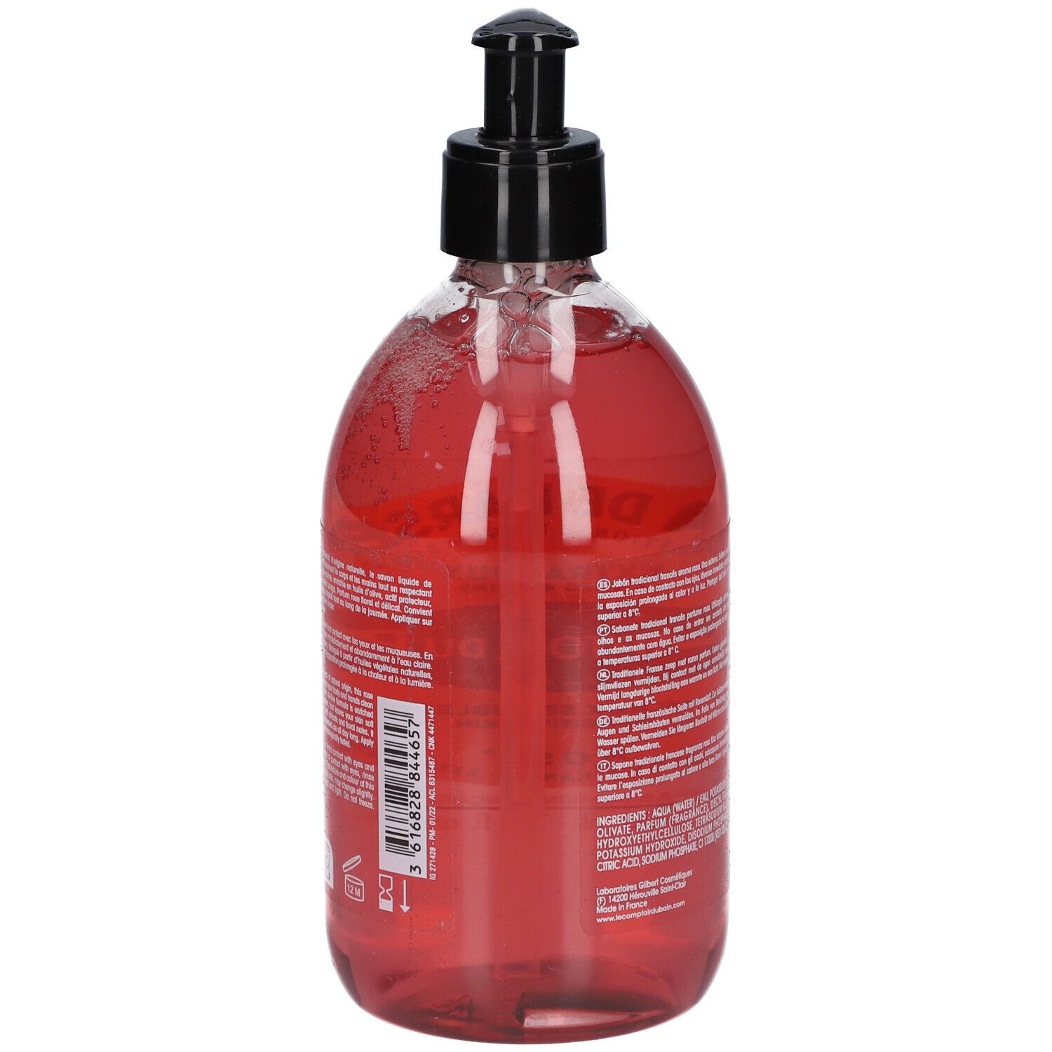 Flacon transparent, liquide rose. Dos avec texte. Pompe noire. Inscriptions: Savon de Marseille, Le Comptoir du Bain.