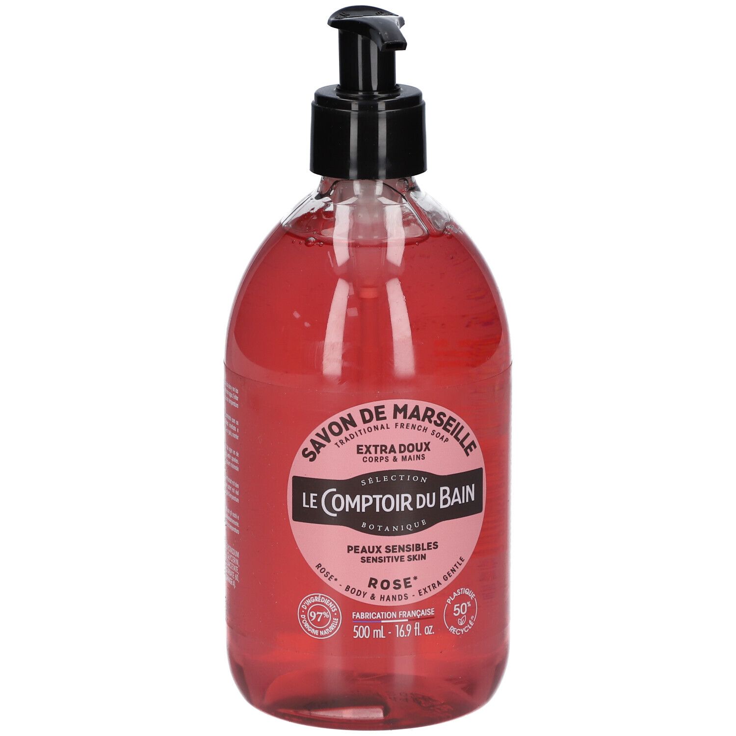 Flacon rond transparent, liquide rose, pompe noire. Inscriptions: Savon de Marseille, Le Comptoir du Bain, Rose. Pour peaux sensibles.