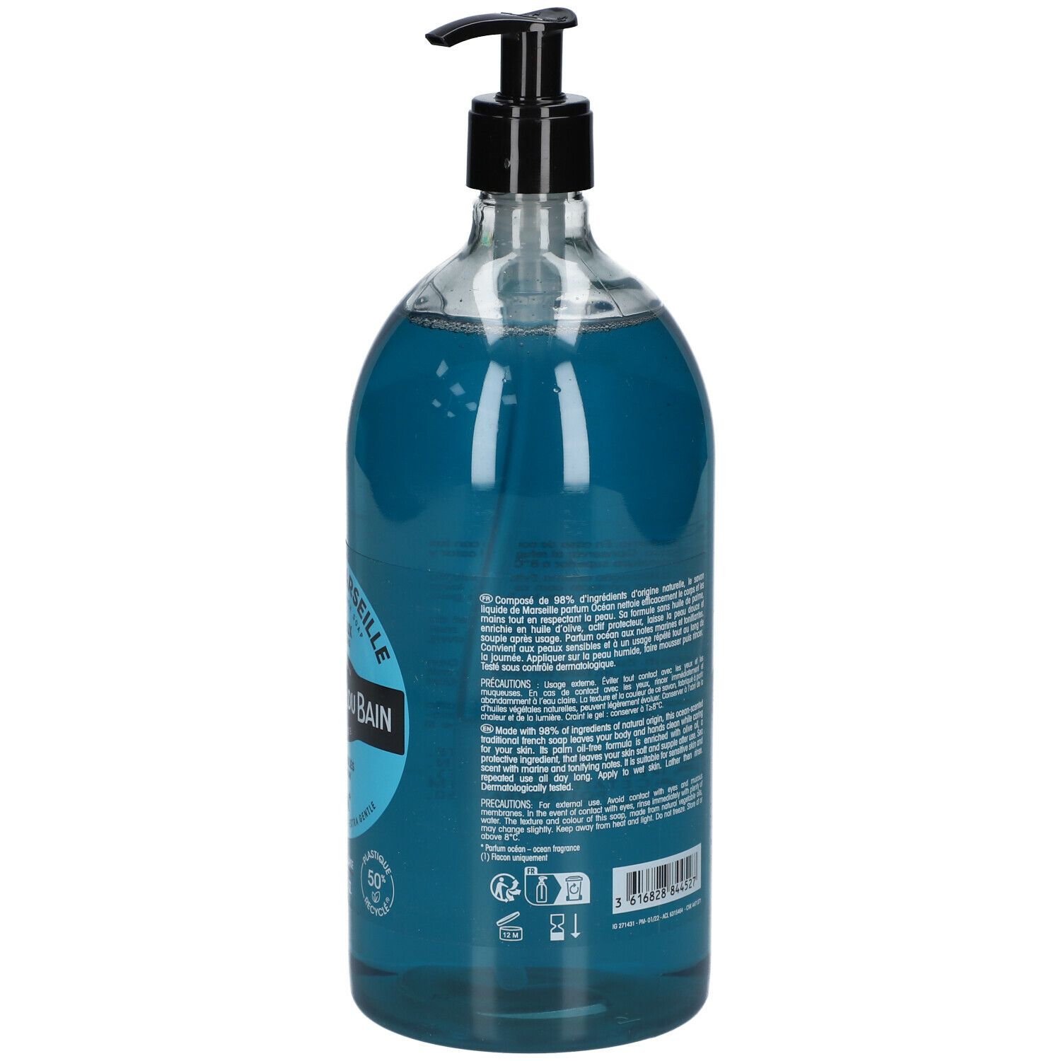 Achterkant van een fles blauwe vloeibare zeep. Zwarte pomp. Tekst en barcode. 1L.