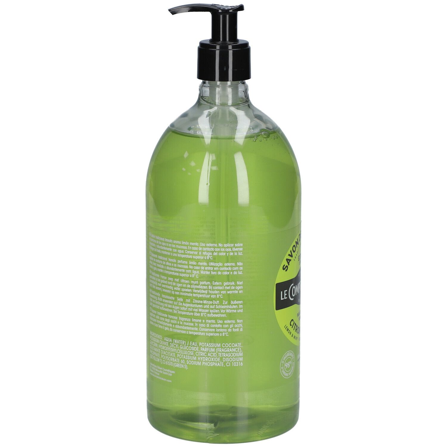 Flacon transparent contenant du savon liquide vert. Texte multilingue au dos. Pompe noire.