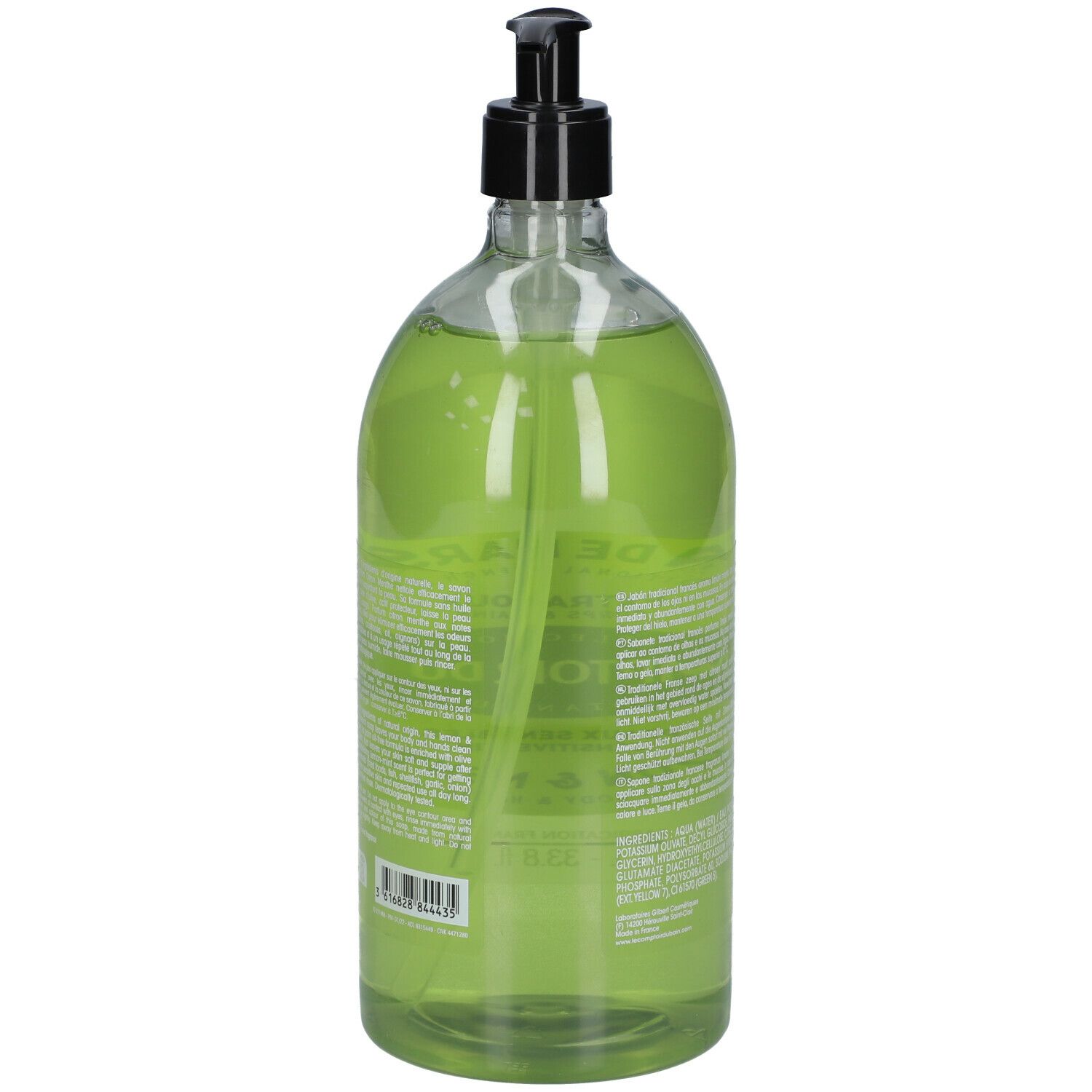 Flacon transparent contenant du savon liquide vert. Dos avec texte. Pompe noire.