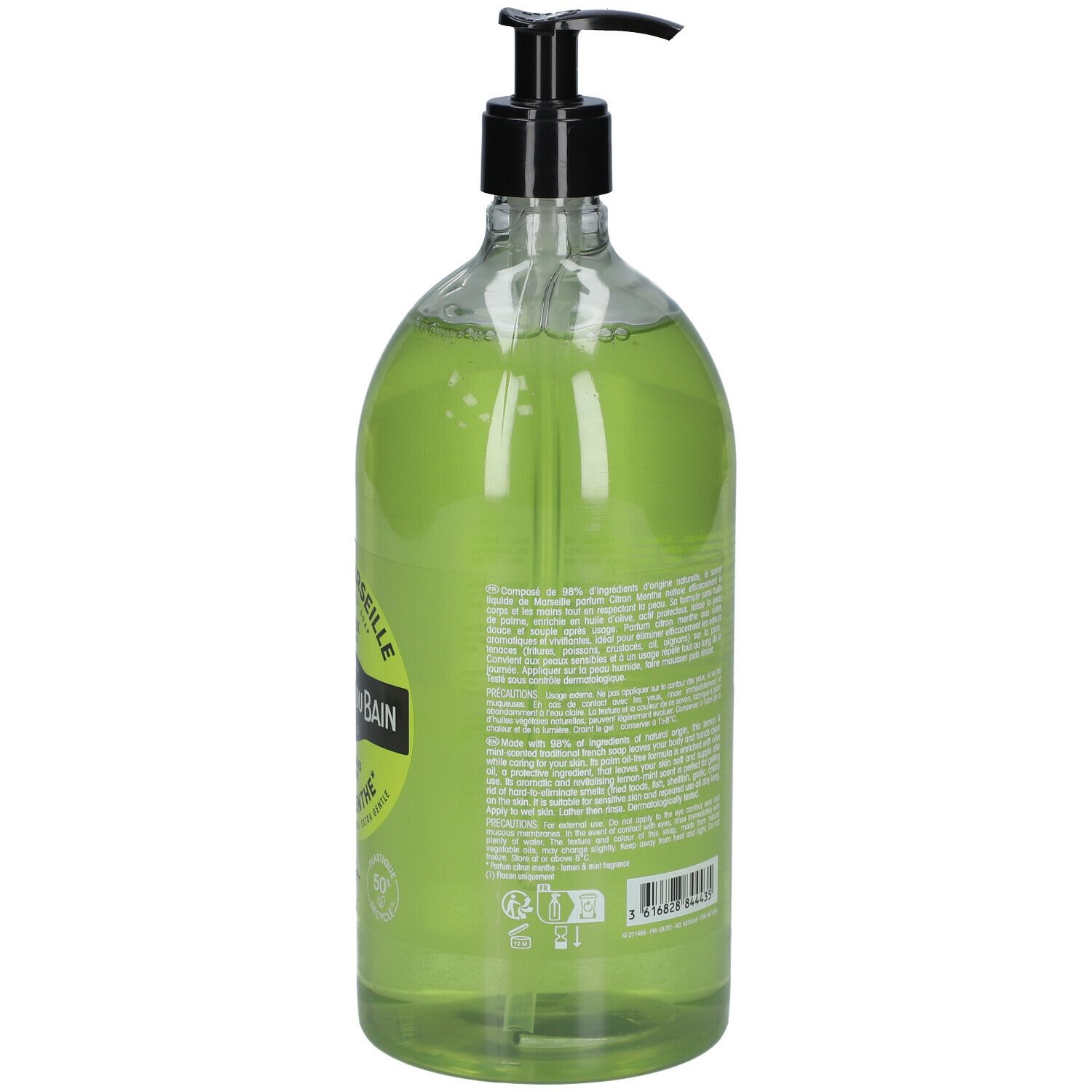 Flacon transparent contenant du savon liquide vert. Dos avec texte. Pompe noire.