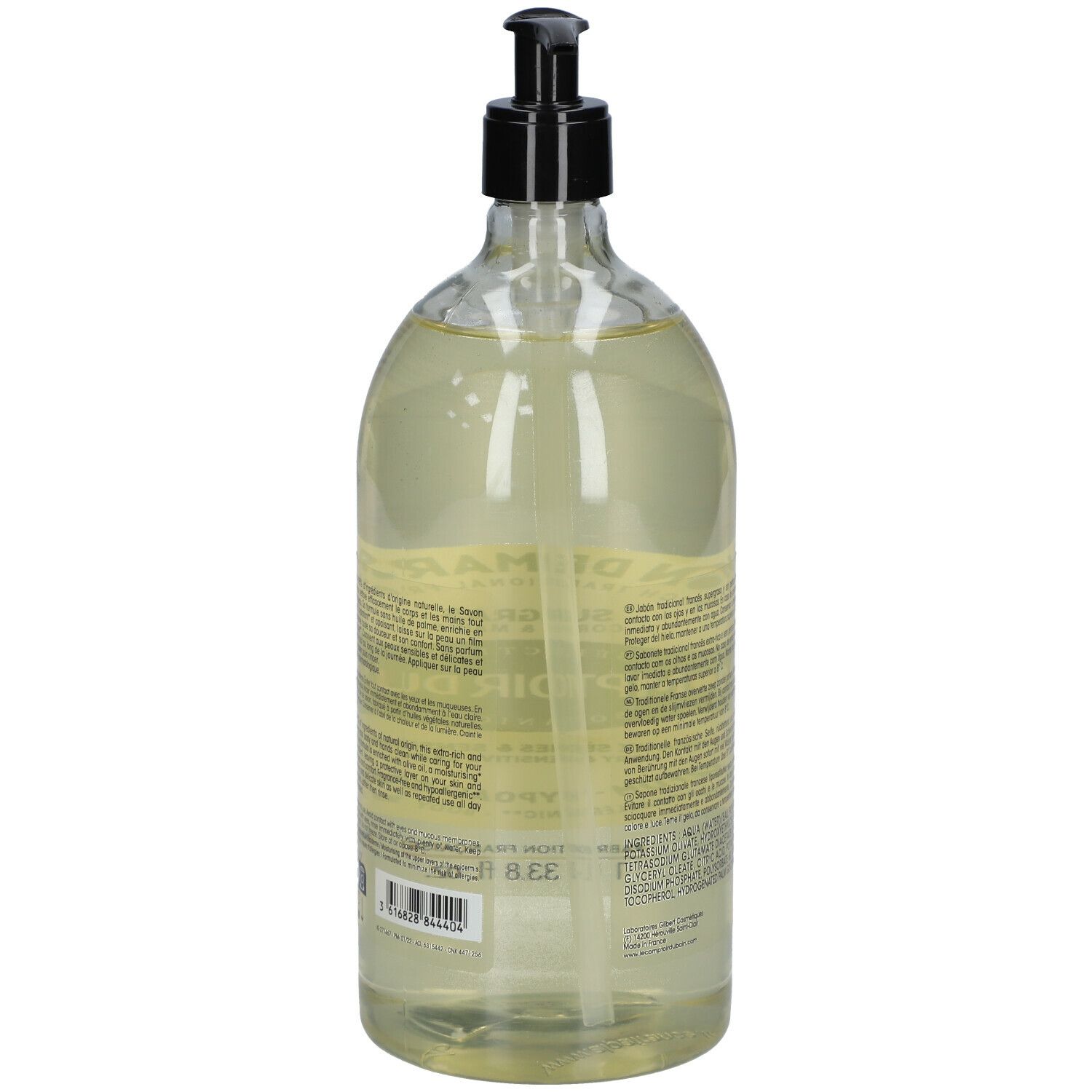 Dos du flacon de savon liquide. Informations textuelles et étiquette avec détails du produit. Tête de pompe noire.