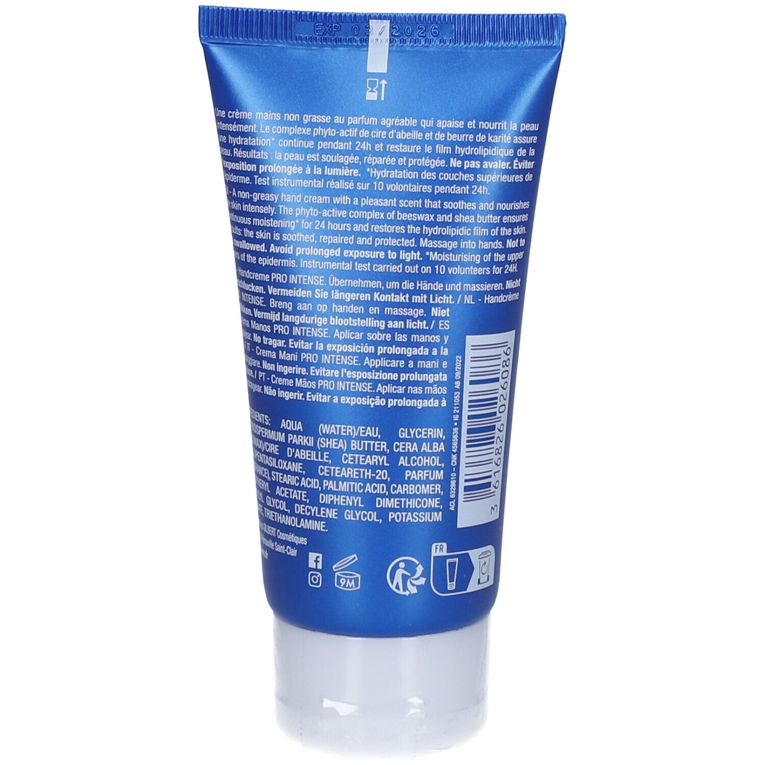 Achterkant van de handcrèmetube. Blauwe kleur. Tekst in meerdere talen. Bevat ingrediënten en gebruiksaanwijzing.