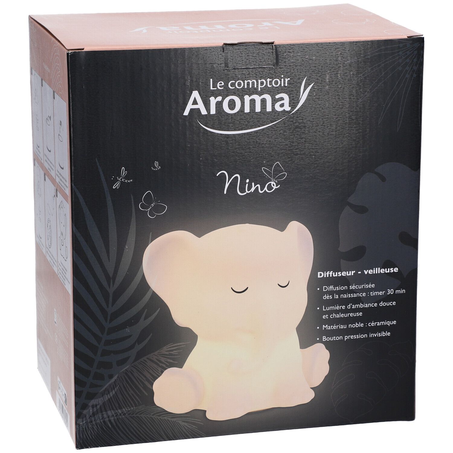 Diffuseur veilleuse NINO sur carton noir. Logo: Le comptoir Aroma. Forme d'éléphant, lumineux.