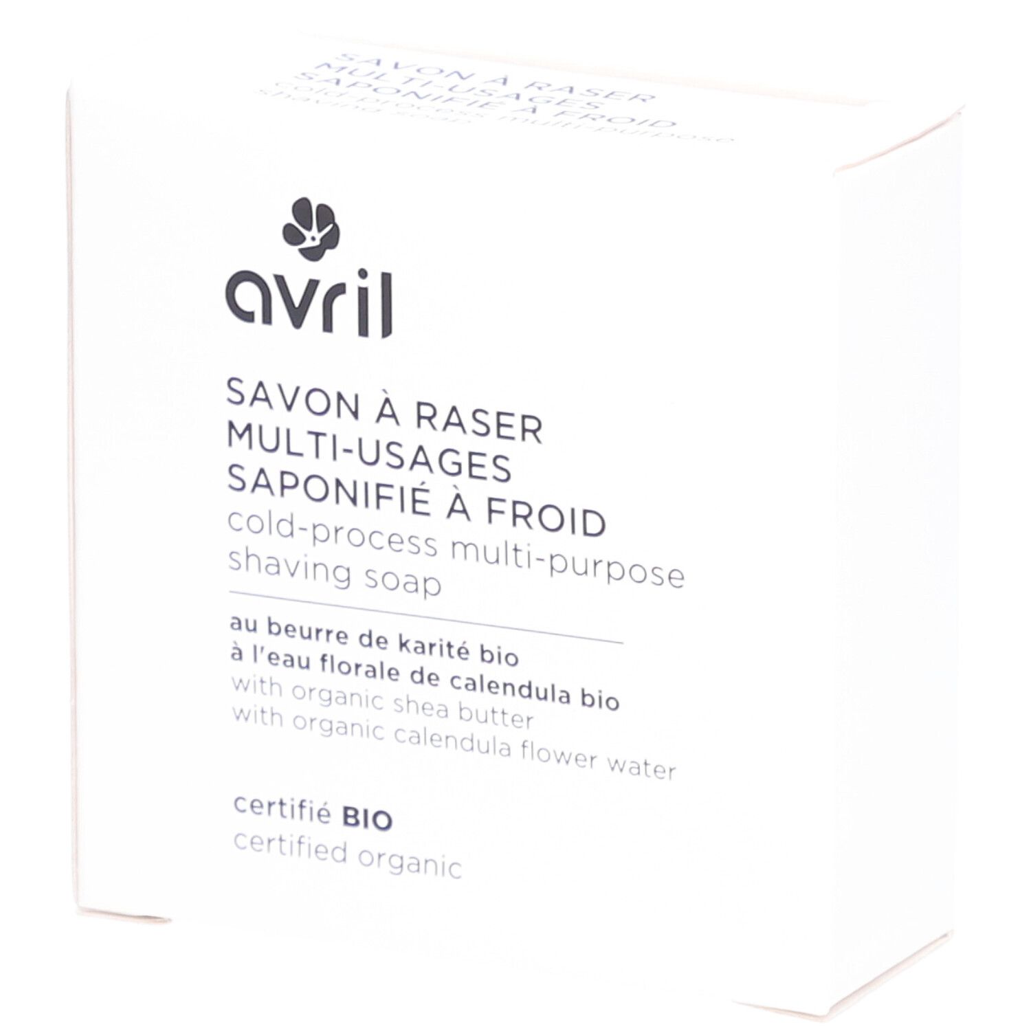Witte kartonnen verpakking. Opschrift: avril, Savon à raser multi-usages, saponifié à froid, cold-process multi-purpose shaving soap. Bio-certificering.