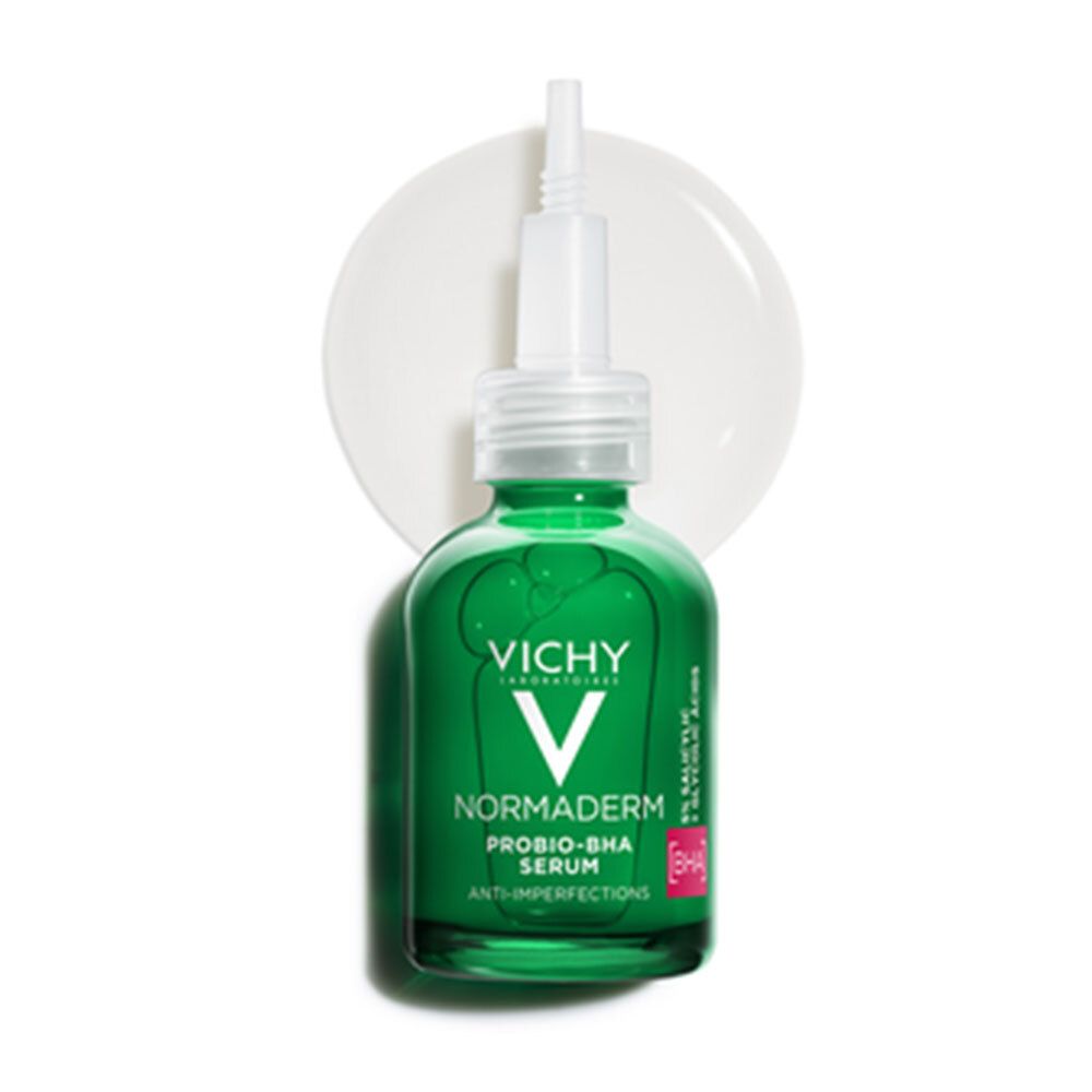 Flacon de sérum Vichy Normaderm vert avec pipette. Sur fond blanc. Logo Vichy visible.