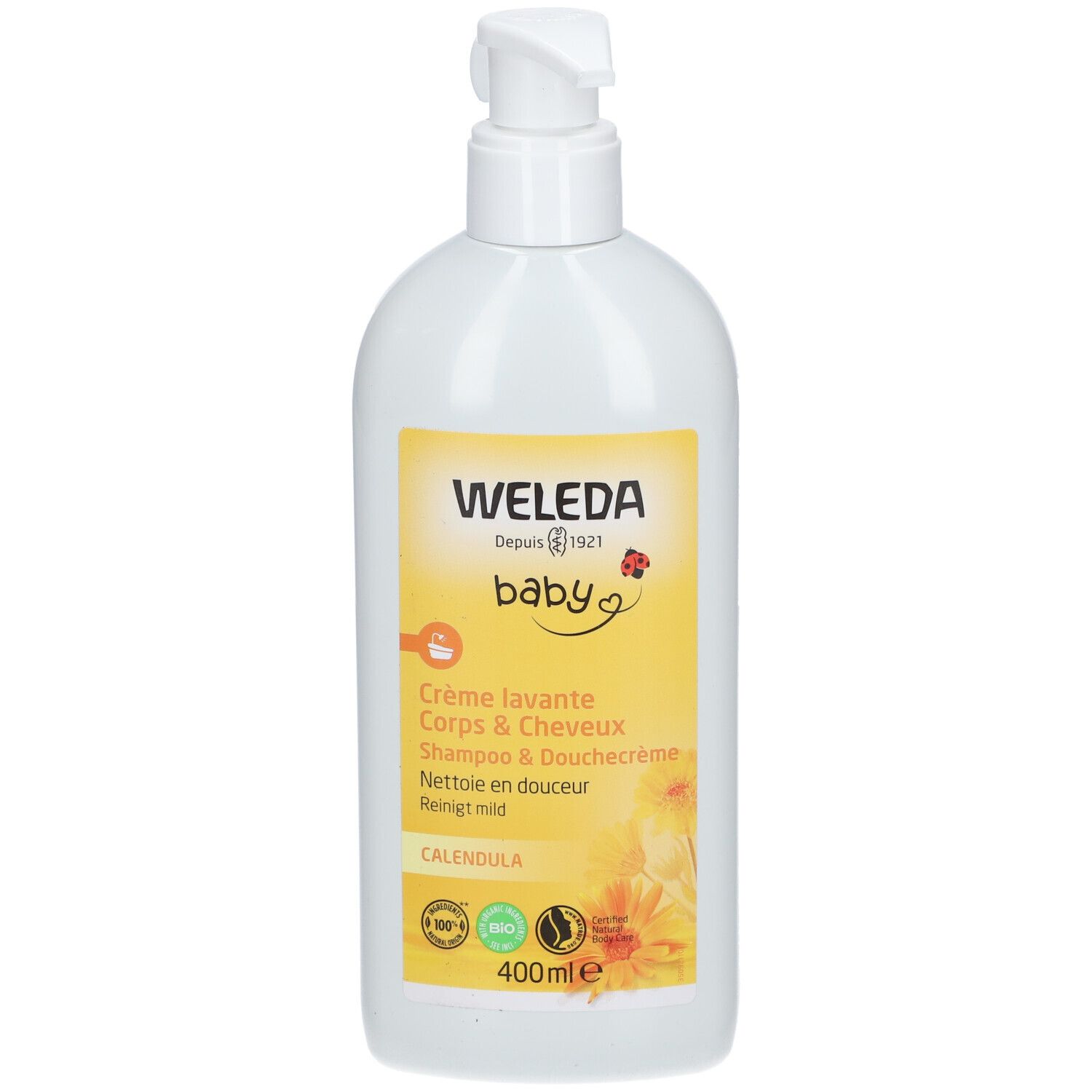 Flacon blanc avec étiquette jaune. Inscription: WELEDA Baby, Crème lavante Corps & Cheveux, Calendula. Avec pompe.