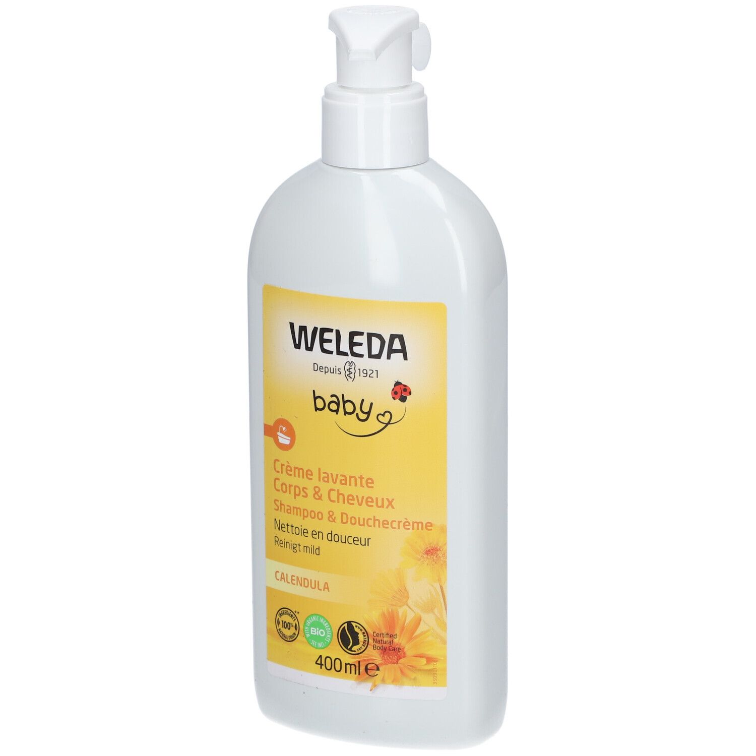 Flacon blanc avec étiquette jaune. Inscription: WELEDA Baby, Crème lavante Corps & Cheveux, Calendula. Avec pompe.