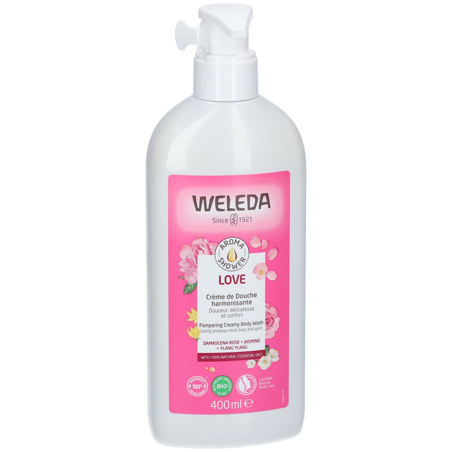 Flacon blanc avec pompe. Étiquette rose avec logo WELEDA, nom LOVE et illustrations florales. Contenance 400ml.