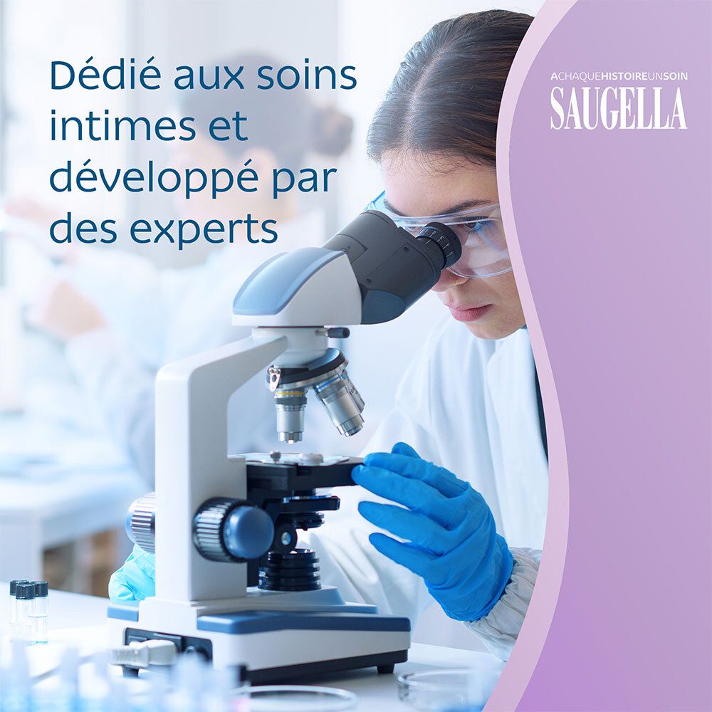 Visuel publicitaire avec femme et microscope. Inscription SAUGELLA. Texte et description.