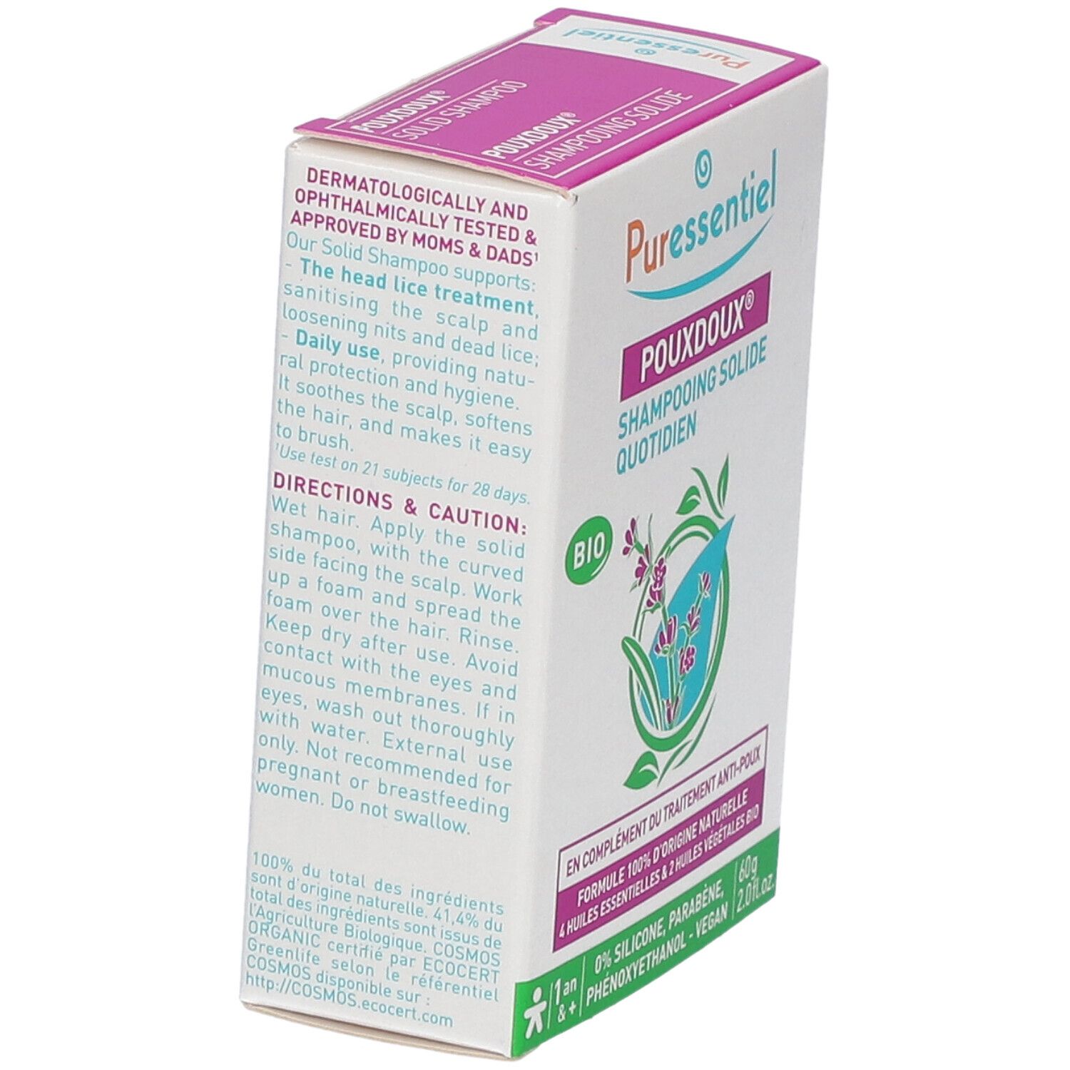 Vue en biais de l'emballage du produit. Texte sur les tests dermatologiques et les instructions d'utilisation visibles.