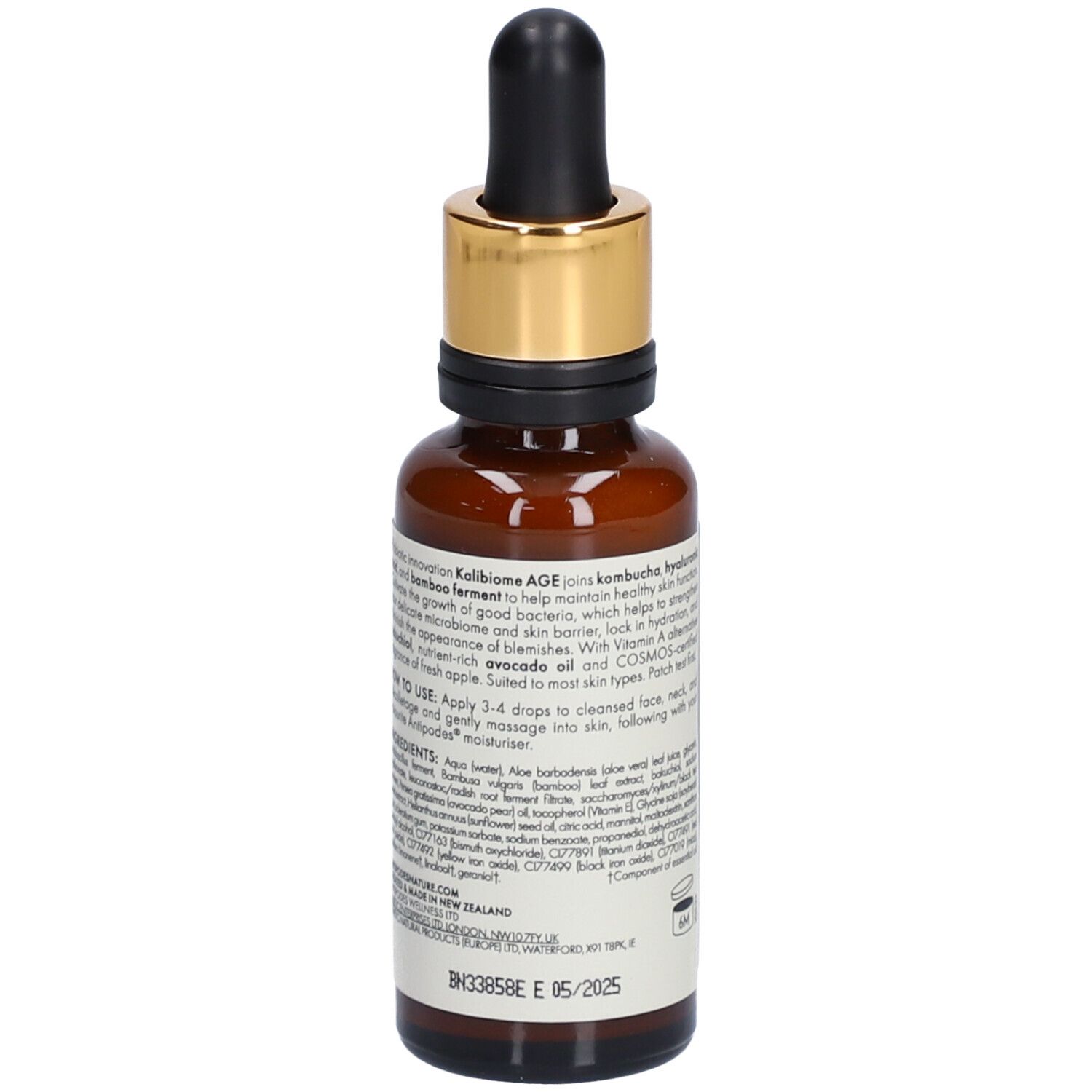 Braune Glasflasche mit goldener Kappe und Pipette. Aufkleber mit Produktinformationen und Inhaltsstoffen. Vegan-Siegel.