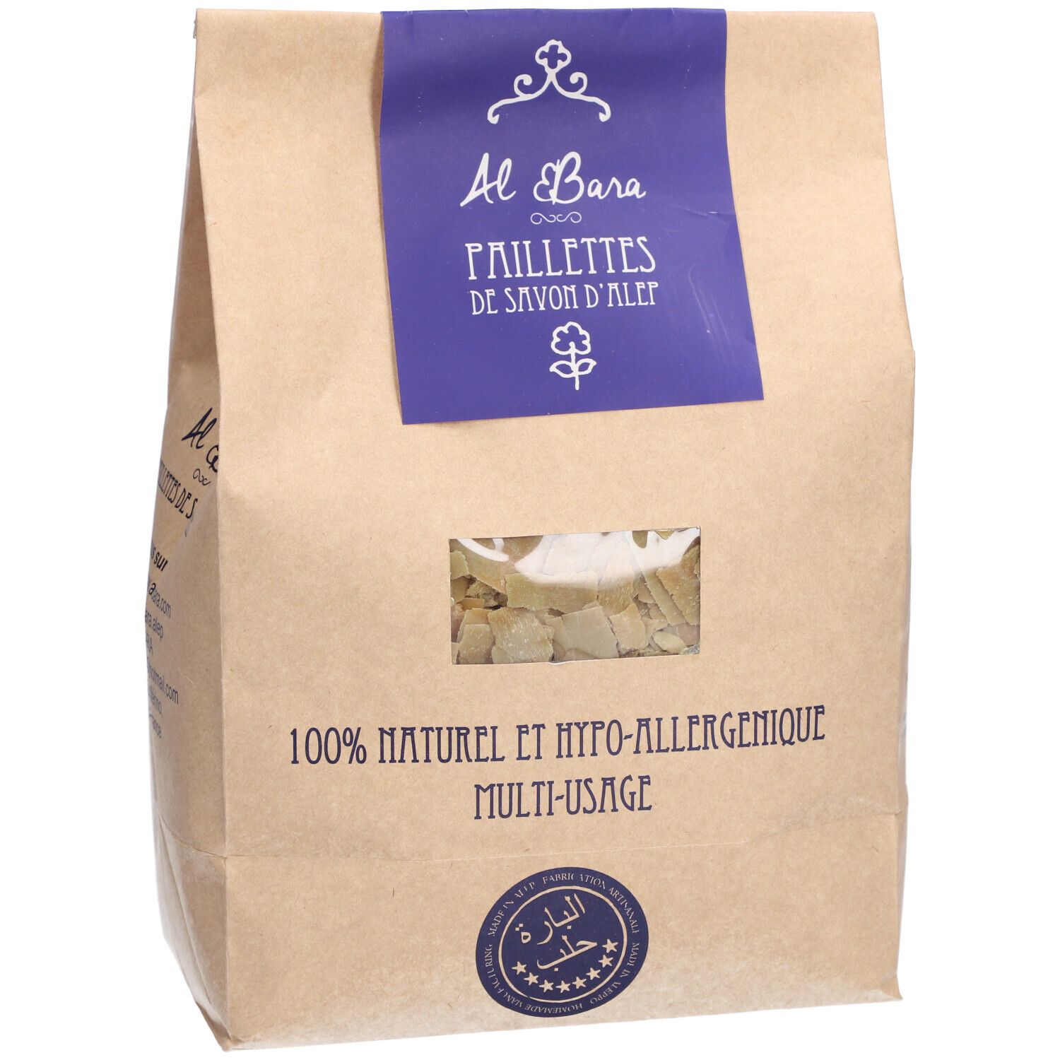 Beutel mit Seifenflocken. Sichtfenster. Blaue Banderole mit "Al Bara" und "PAILLETTES DE SAVON D'ALEP". Aufdruck: "100% NATUREL ET HYPO-ALLERGENIQUE".